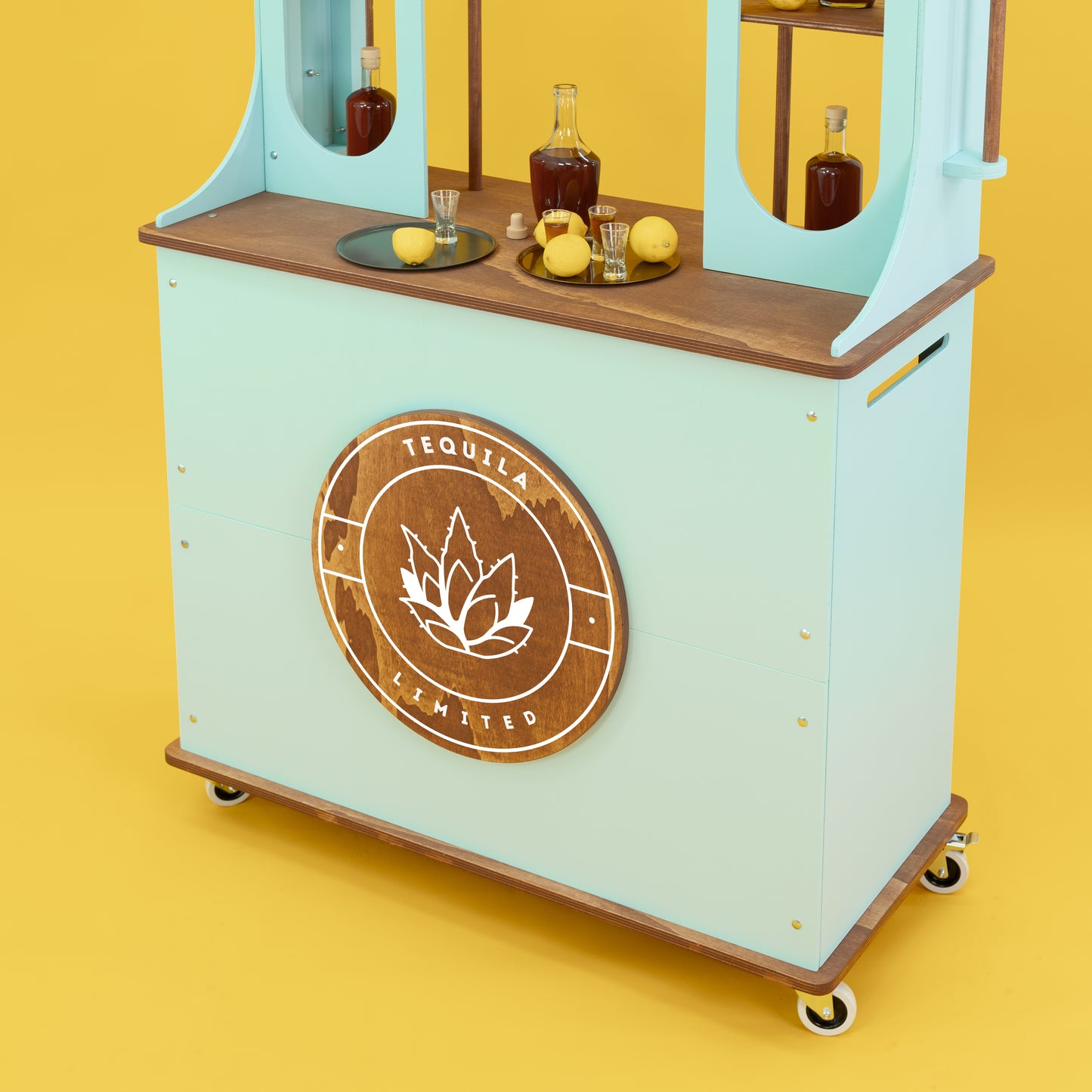 mint green version of wagon bar event cart for immersive retail setup