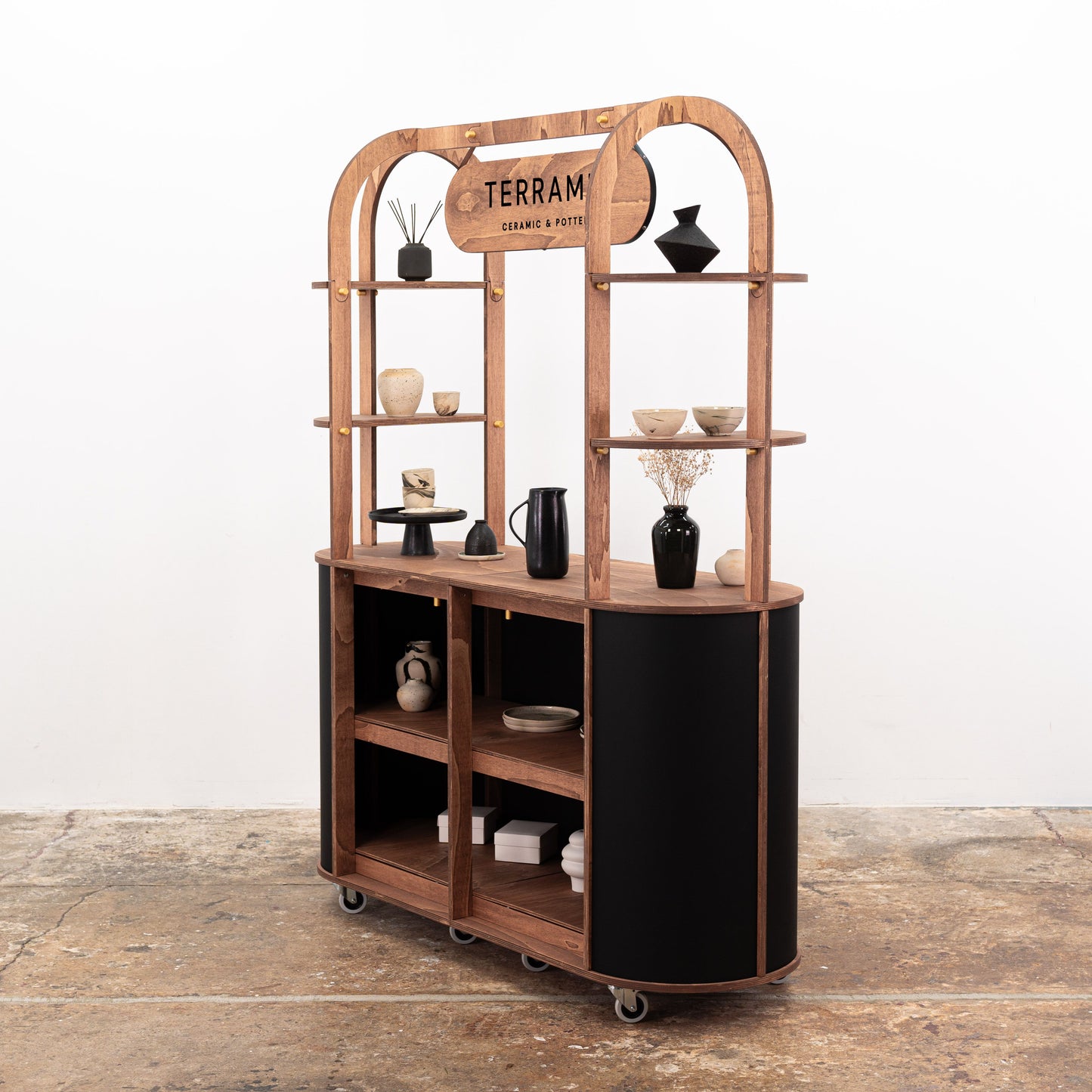 The VC-29 cart used at a trade show booth, showcasing its adaptability for both beverage service and product displays.