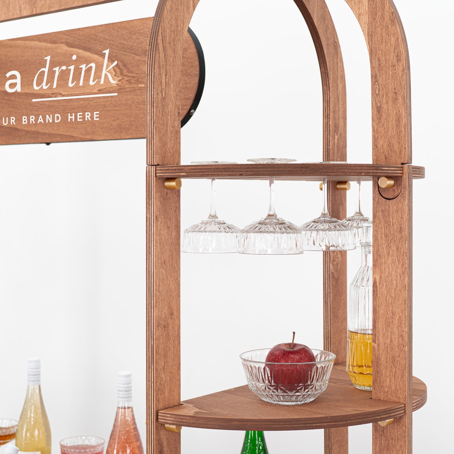 Prosecco bar cart with shelving for wine glasses and drink accessories.