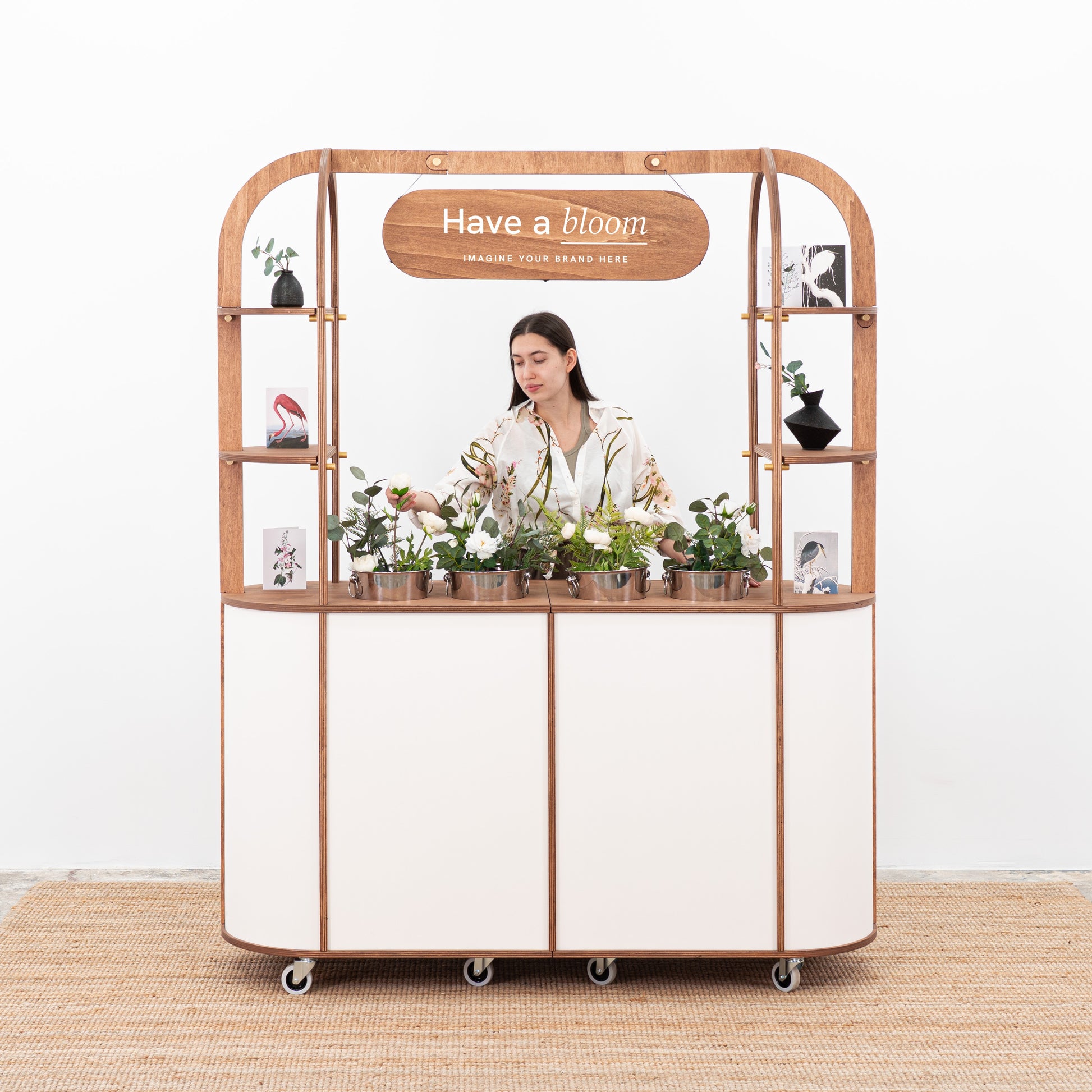 Flower cart with coolers to keep floral arrangements hydrated during events and weddings.