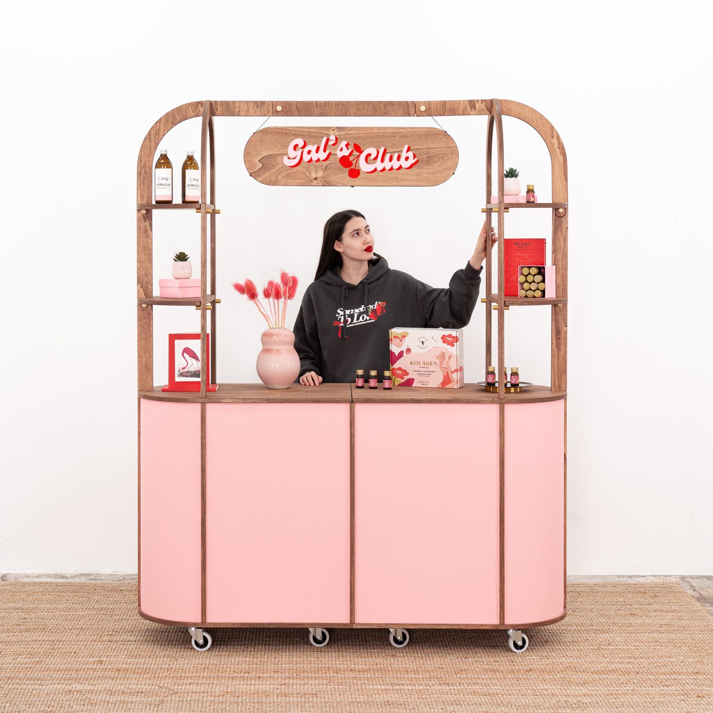 VC-29 cart in use at a wedding or trade show, serving drinks and displaying flowers, with a sleek and stylish appearance.
