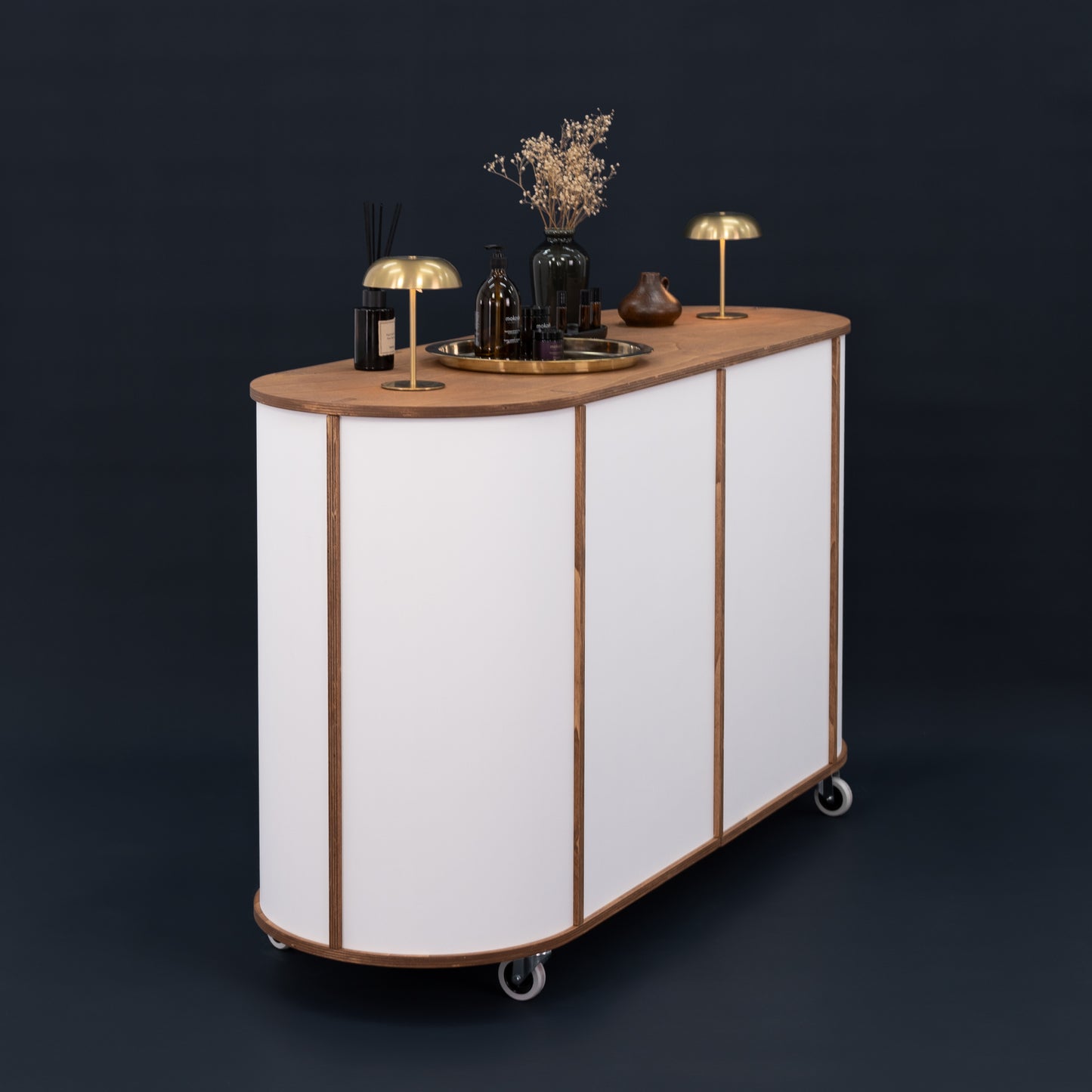 The VC-29 cart in use as both a beverage station and flower bar, illustrating its versatility for different event setups.