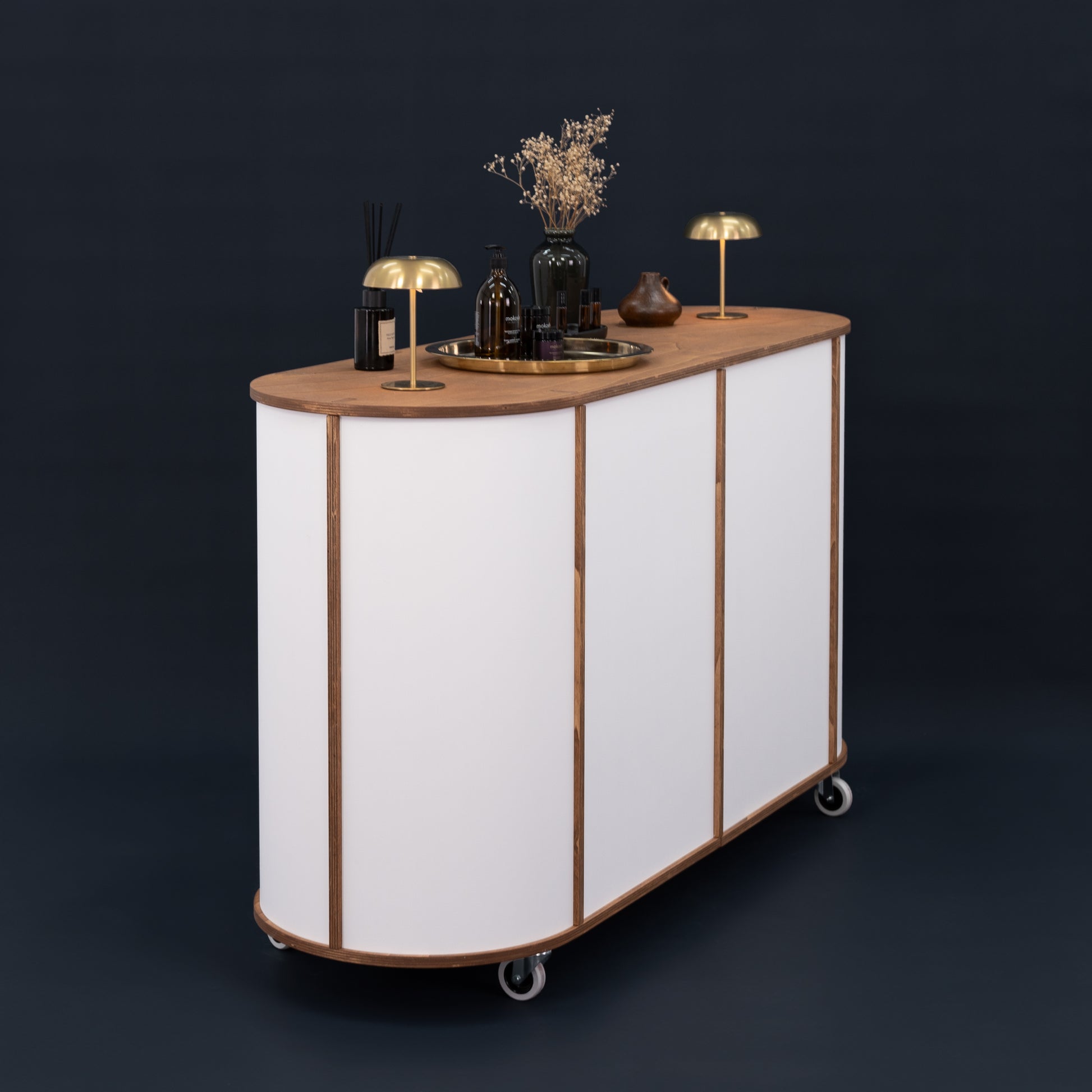 The VC-29 cart in use as both a beverage station and flower bar, illustrating its versatility for different event setups.