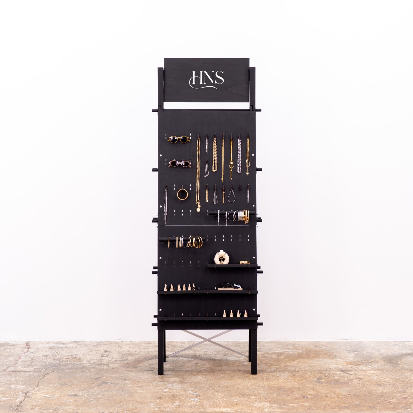 Minimalist wooden pegboard setup for exhibitions and retail booths