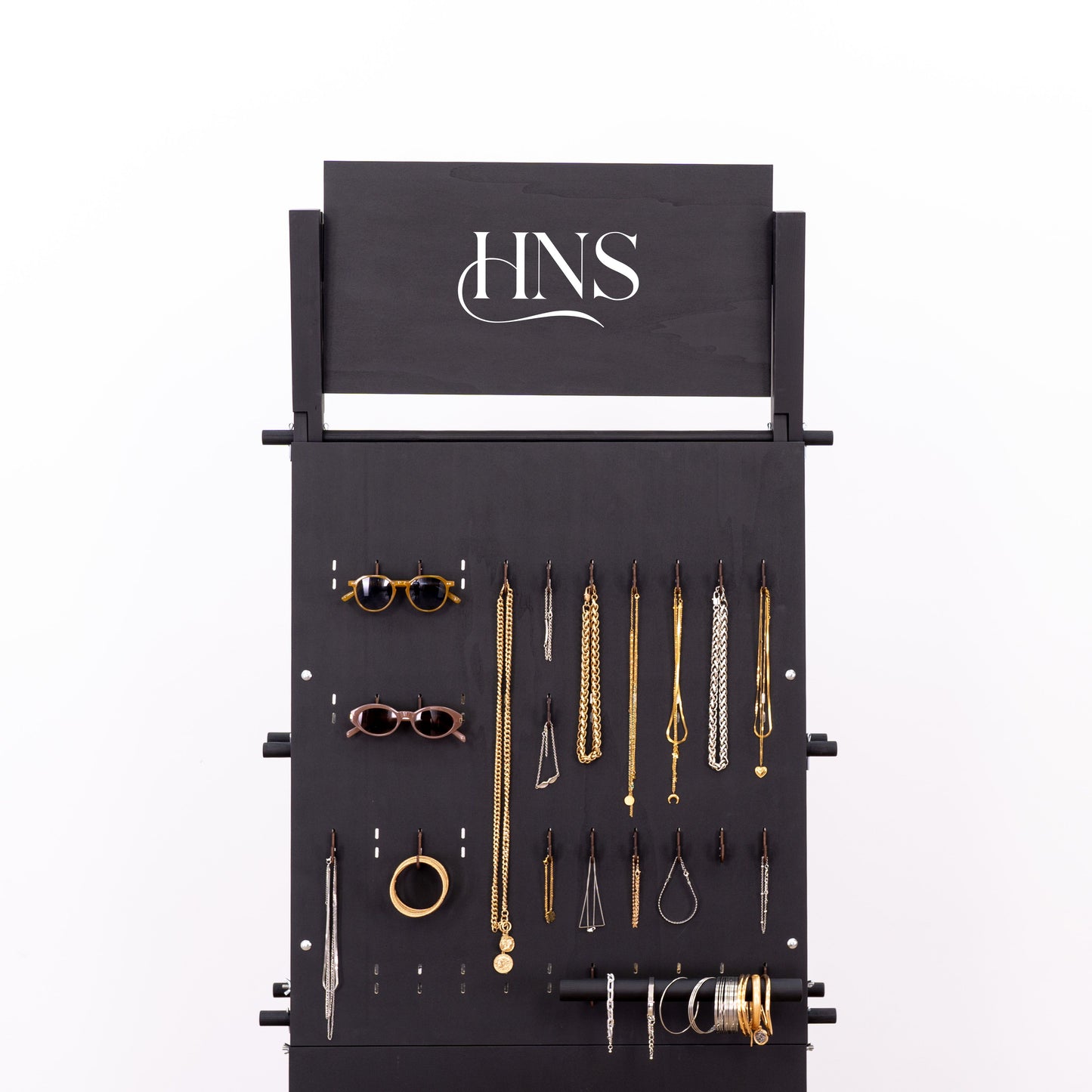Vertical pegboard wall unit for displaying small retail collections
