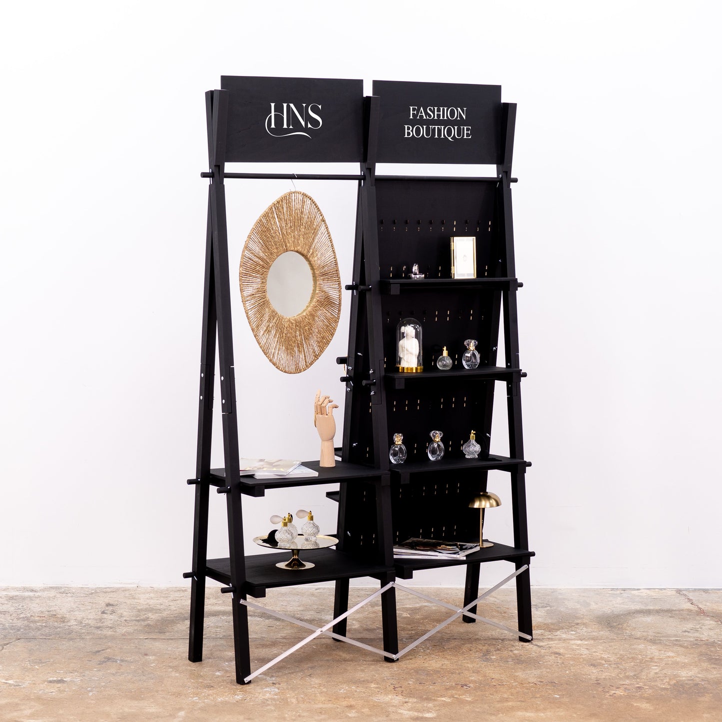 Display rack with mirror, branding signs and open rail for decor