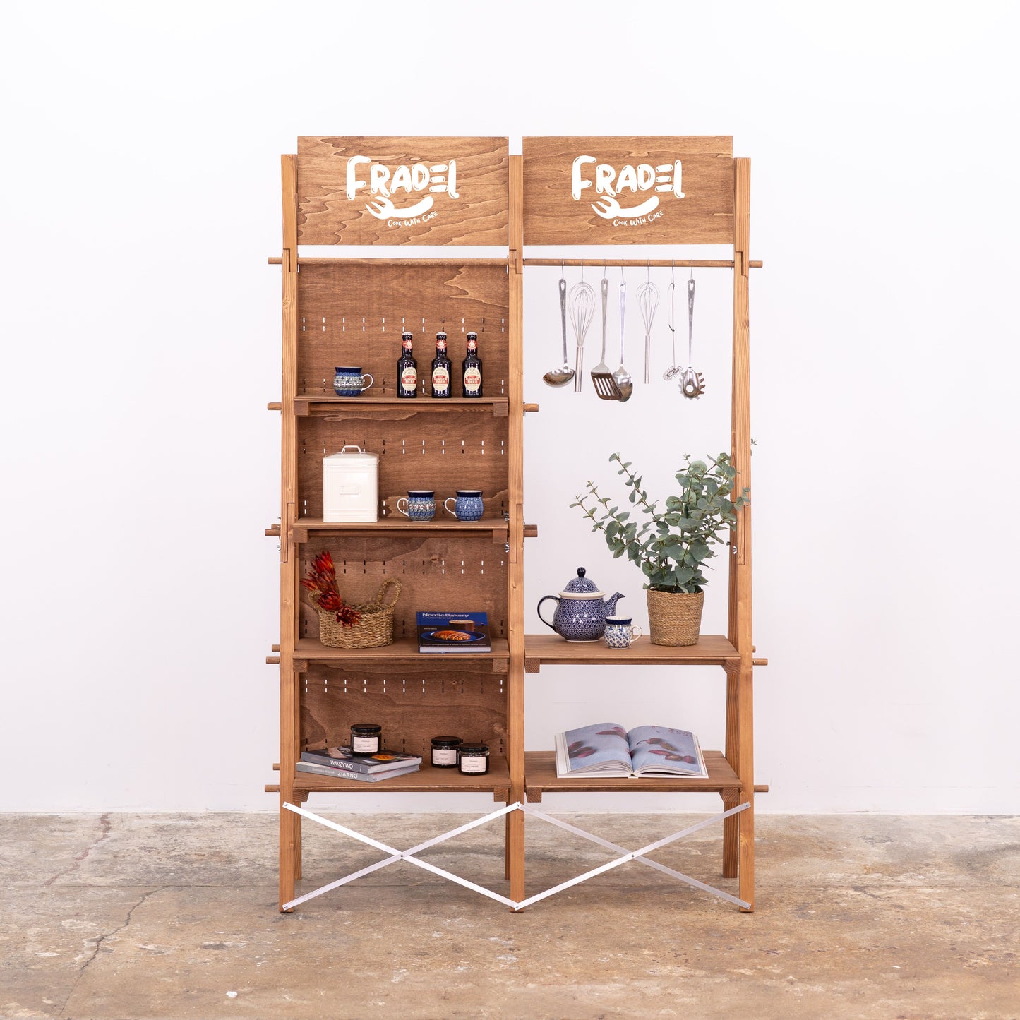 Warm-toned pegboard stand with branding panels and product presentation shelves