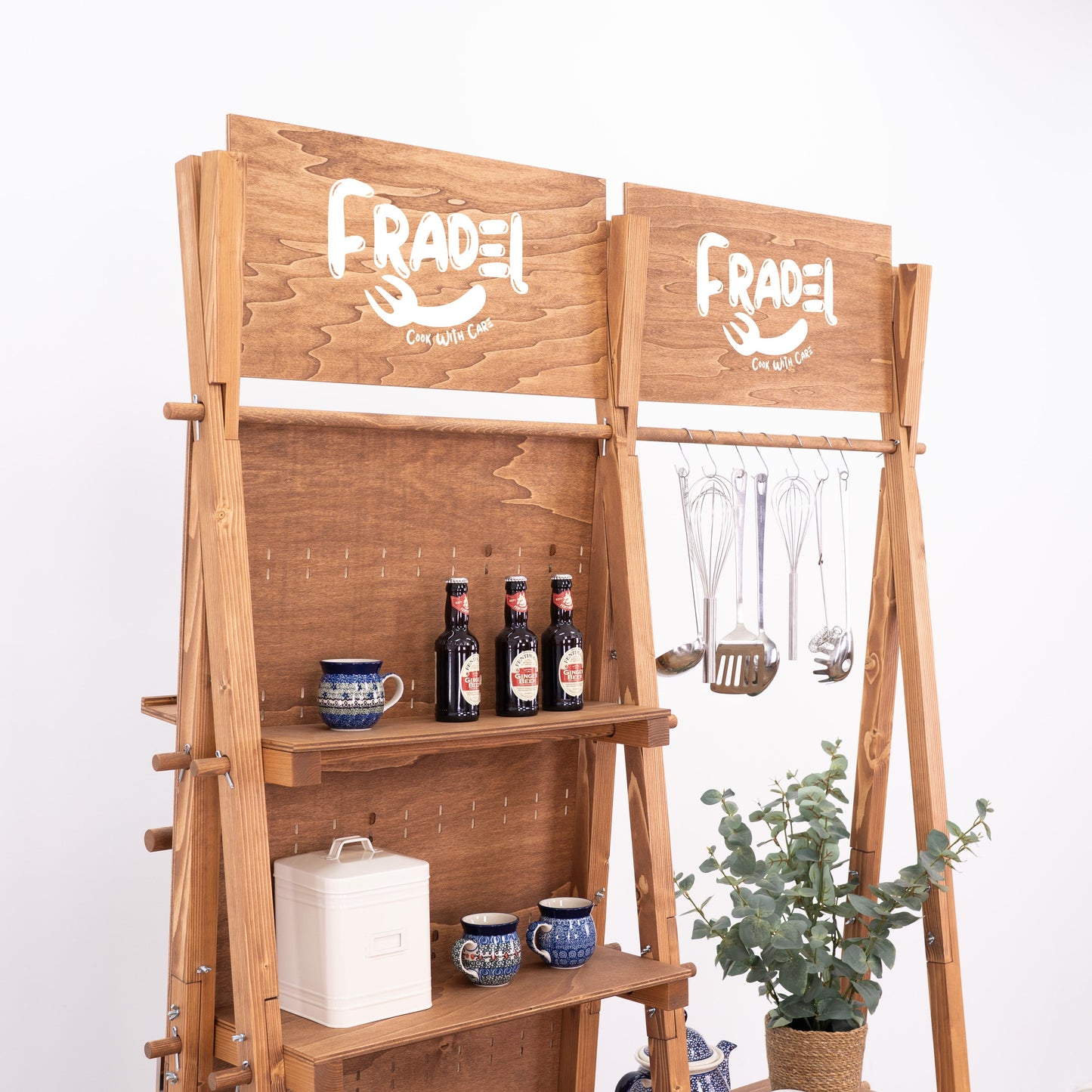 Natural wood retail setup featuring hanging bar and modular pegboard