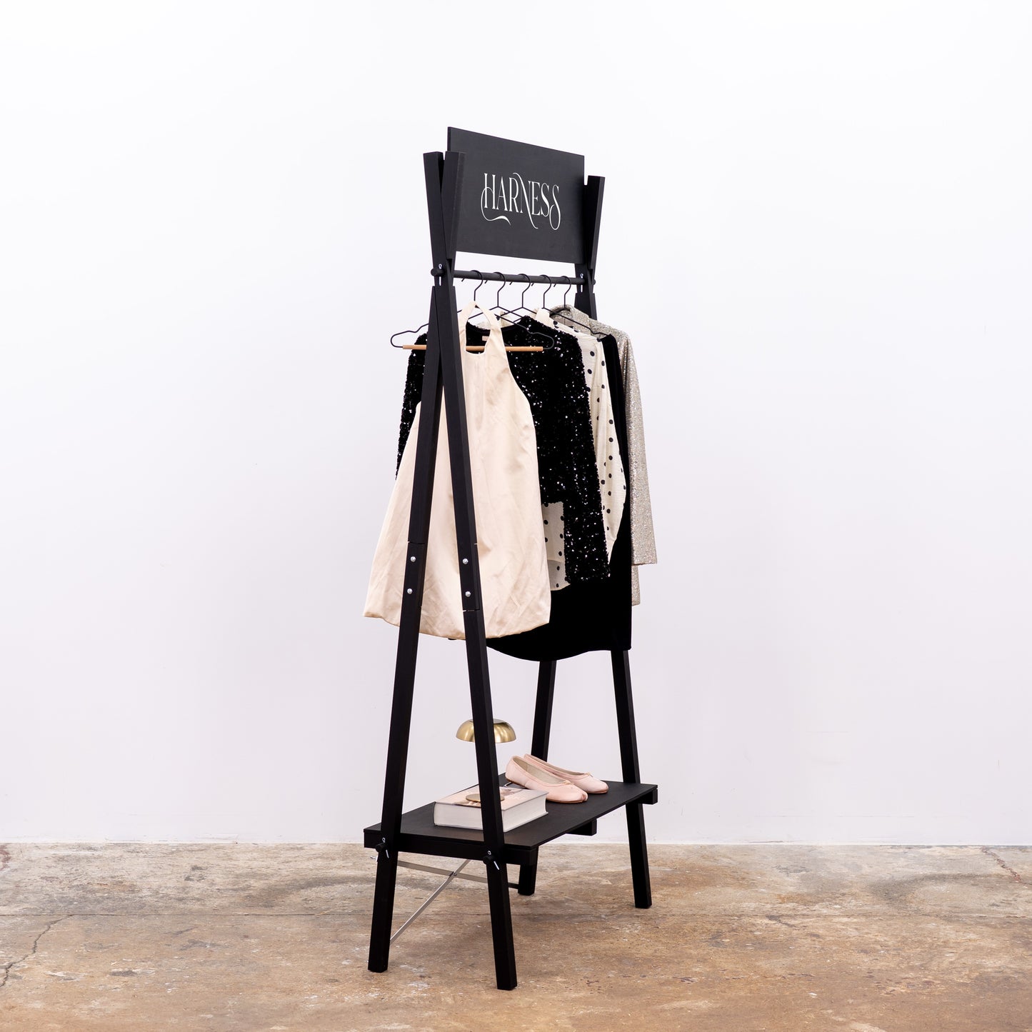 Event-ready clothing stand with branding and dual-display functionality