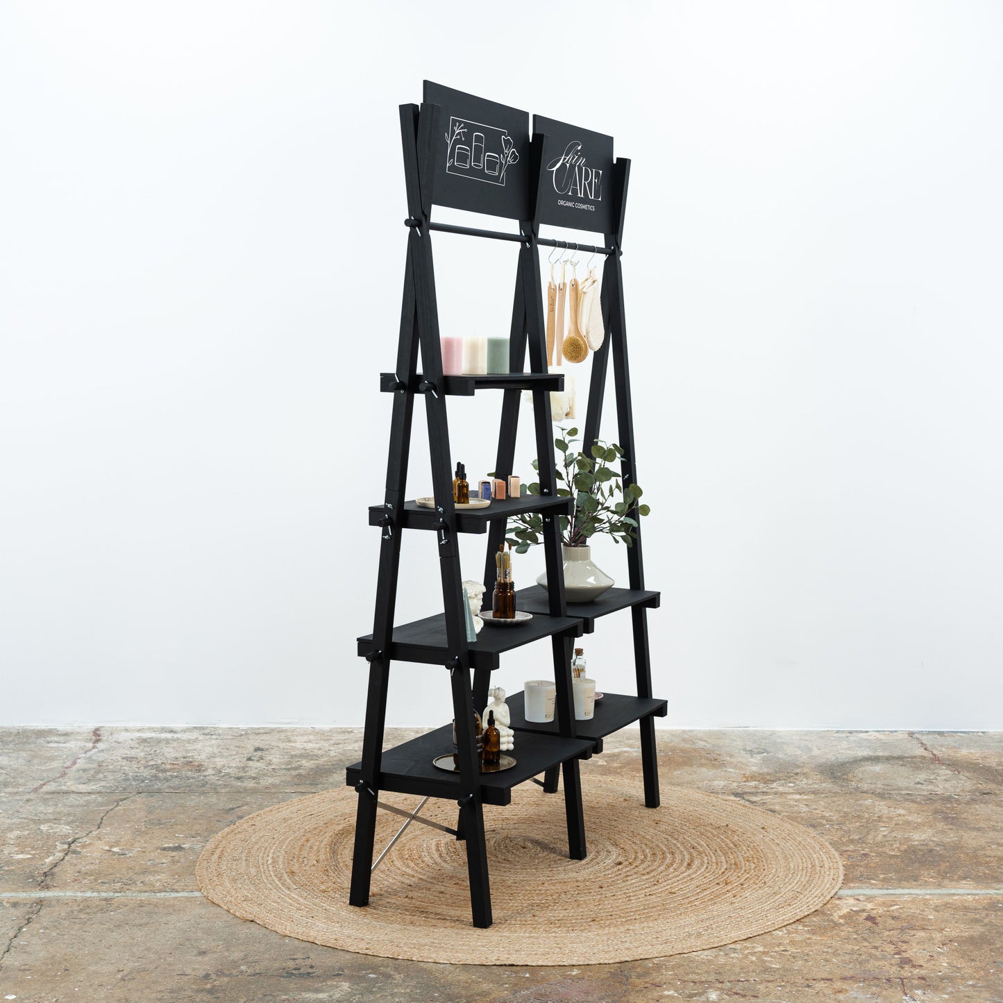 Portable black shelving unit for pop-up shops and events