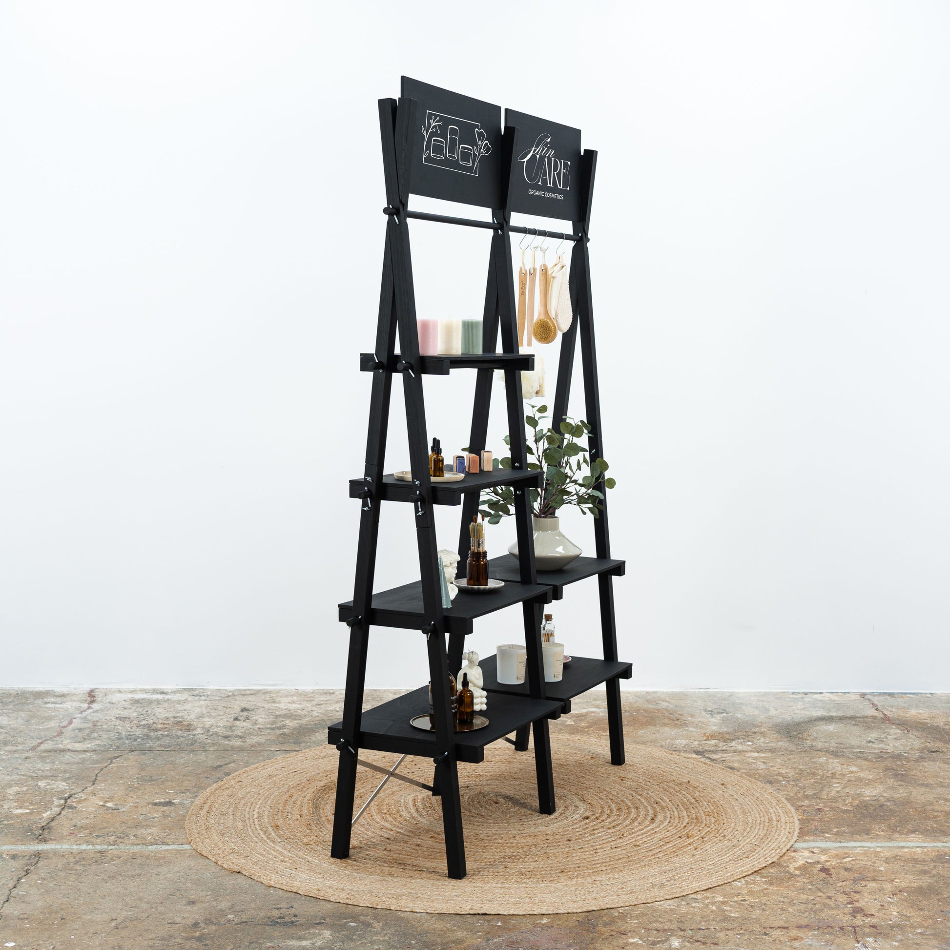 Portable black shelving unit for pop-up shops and events