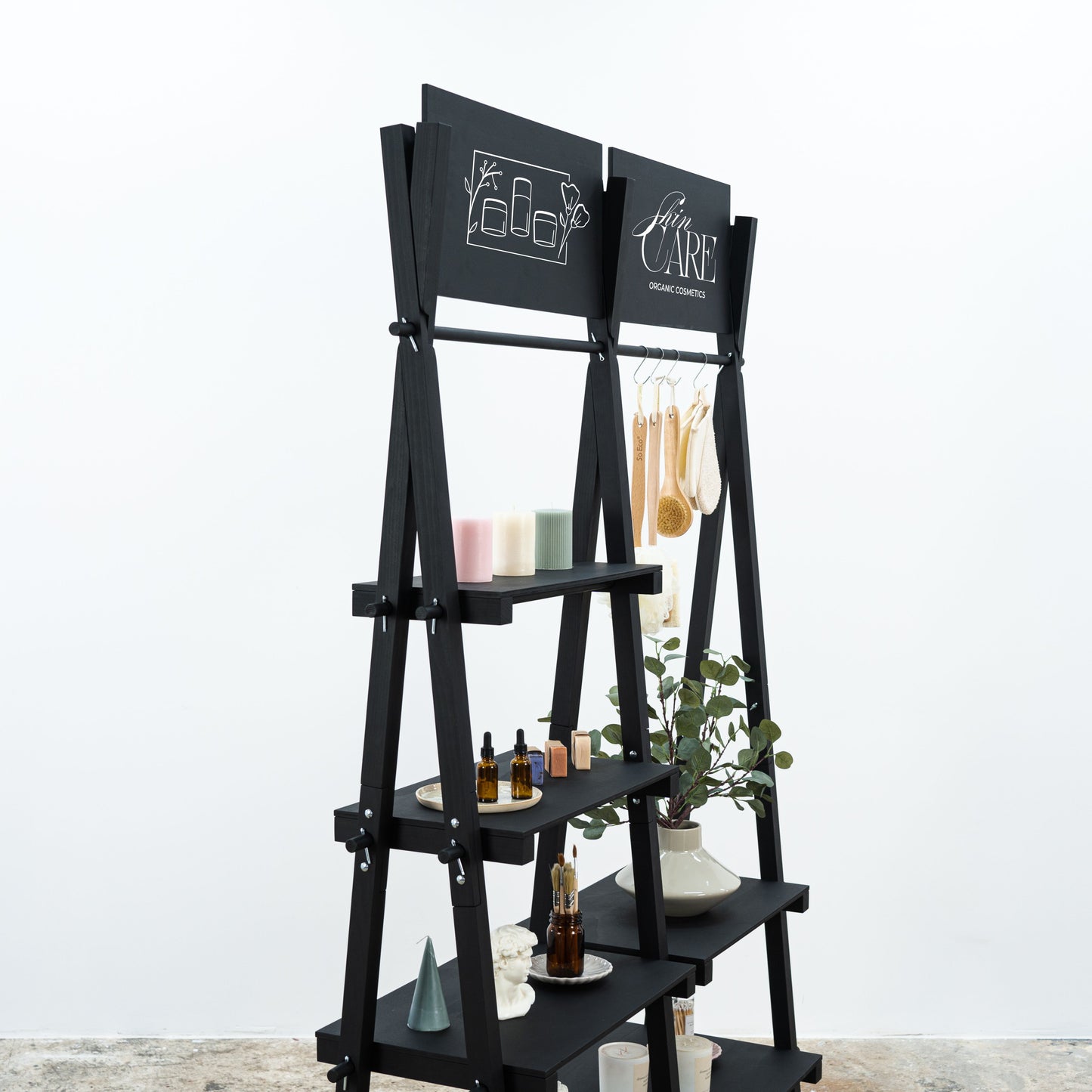 Flat-pack double shelving unit with top branding panel