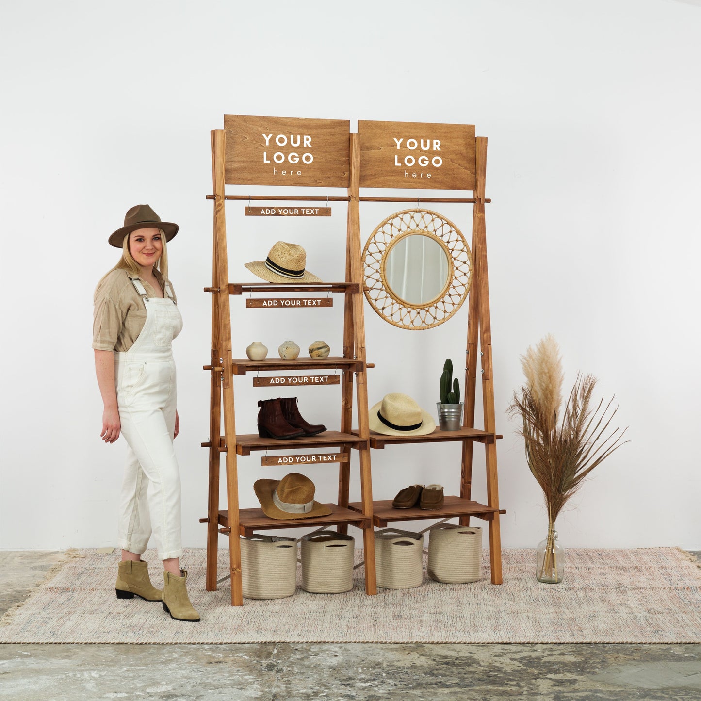Vendor display rack with shelving and top signage for pop-up shops