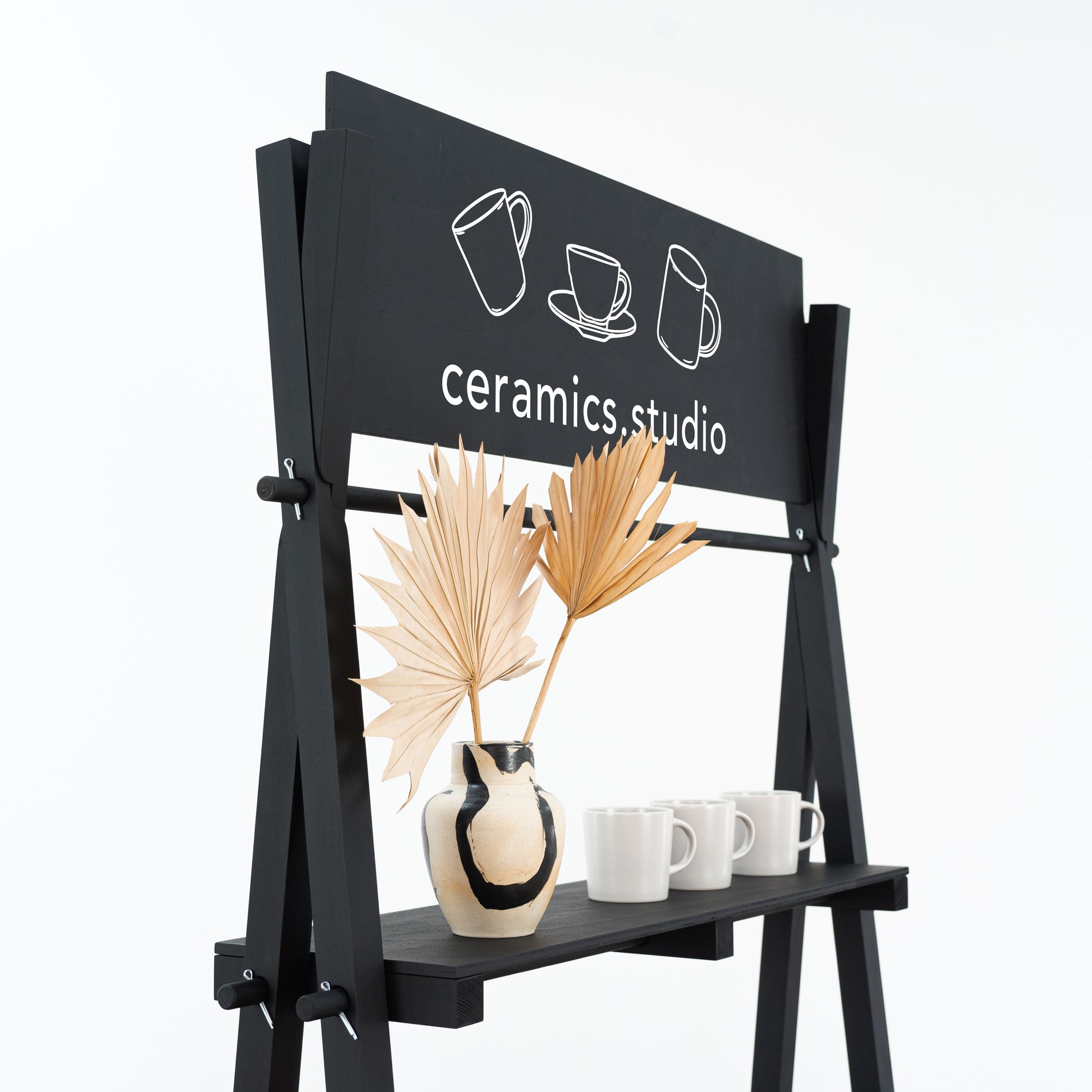Versatile black A-frame display stand for high-end cosmetics, electronics, and decor