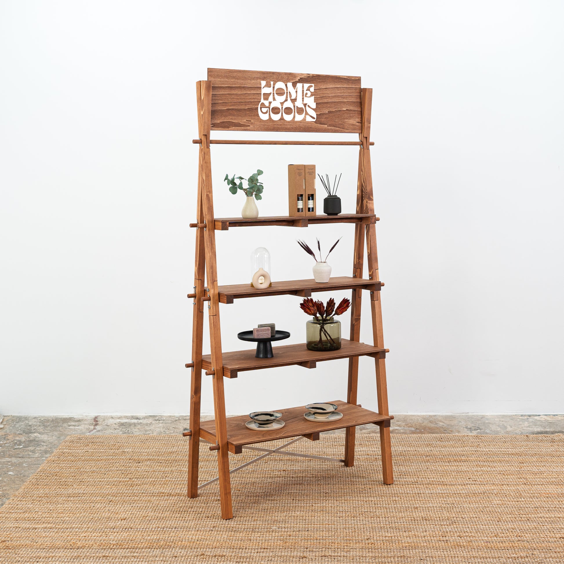 Coffee-colored A-frame shelving unit for artisan markets