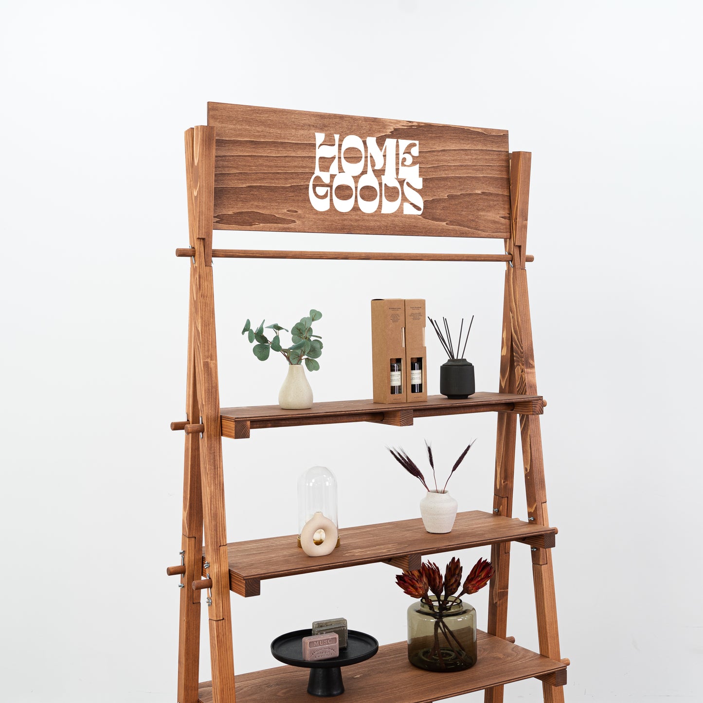 Warm-toned A-frame shelving unit with foldable wooden structure