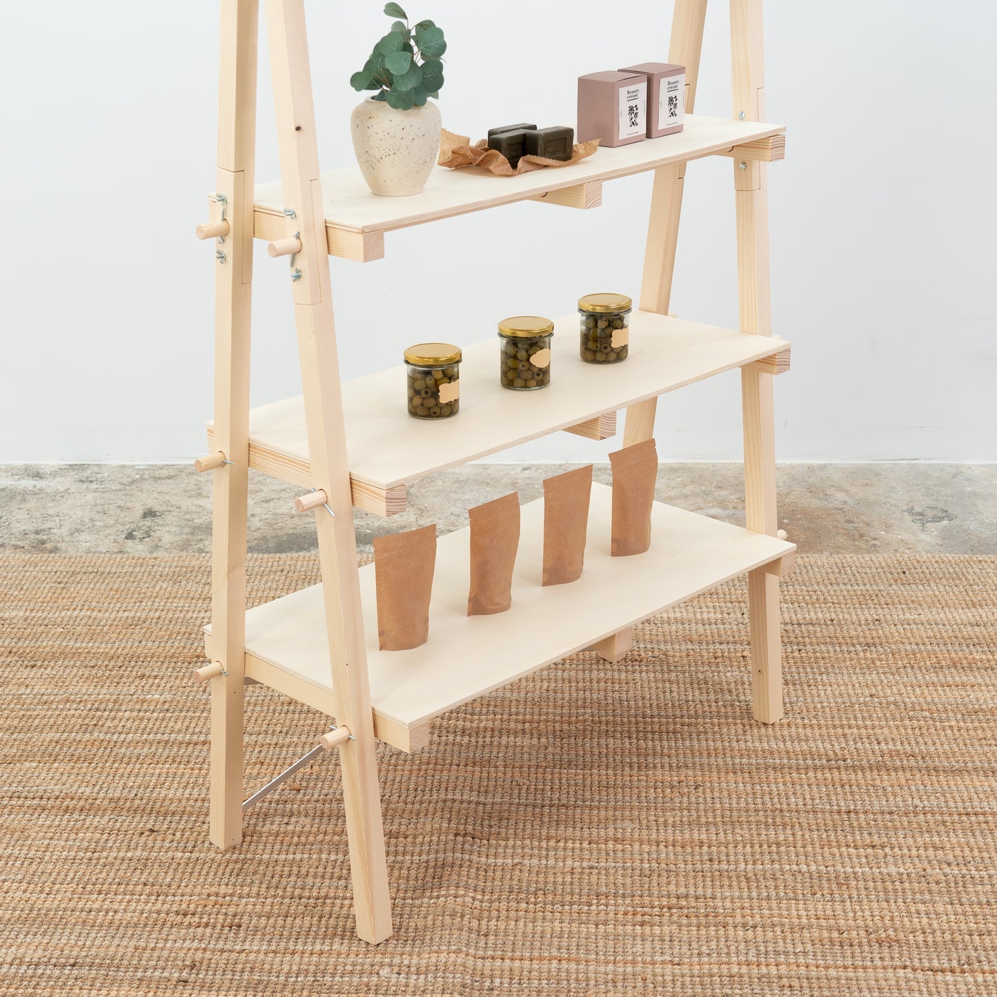Versatile A-frame shelving unit for craft fairs, food stalls, and boutique retail