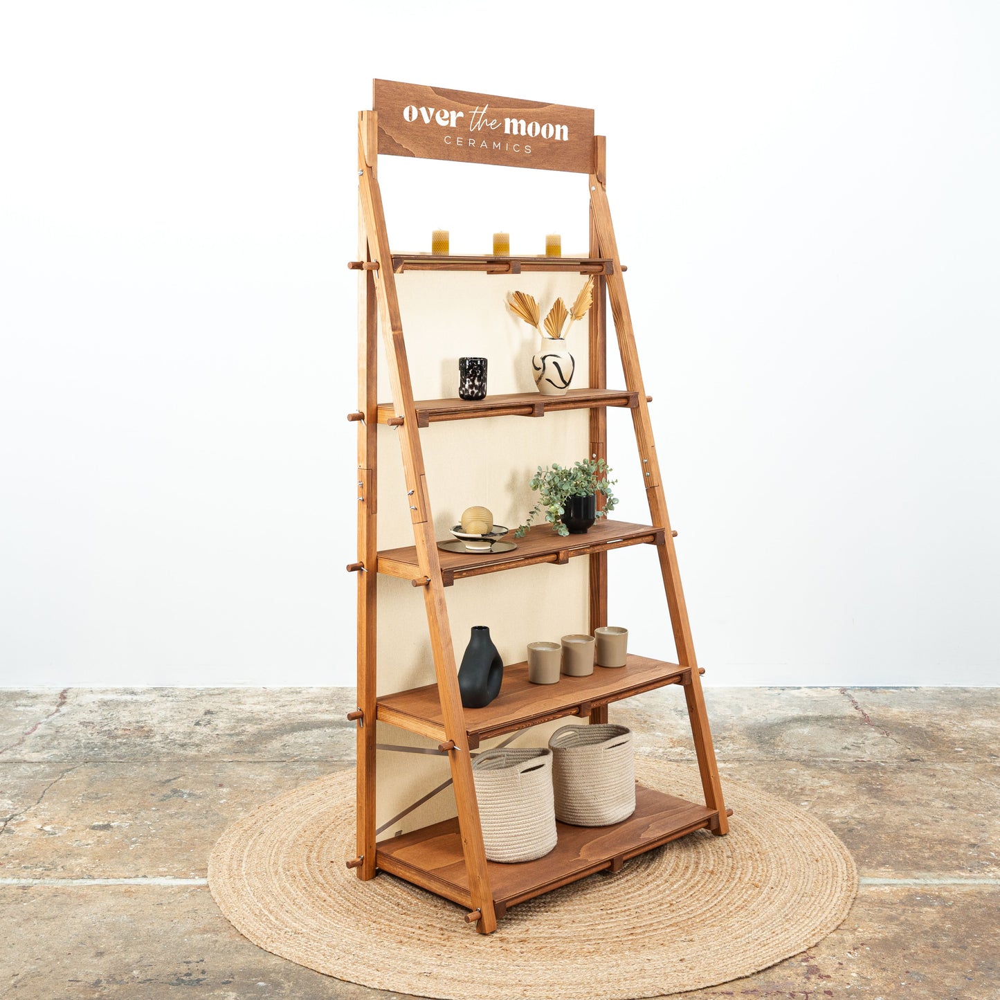 Collapsible retail shelving unit with earthy look for minimalist displays