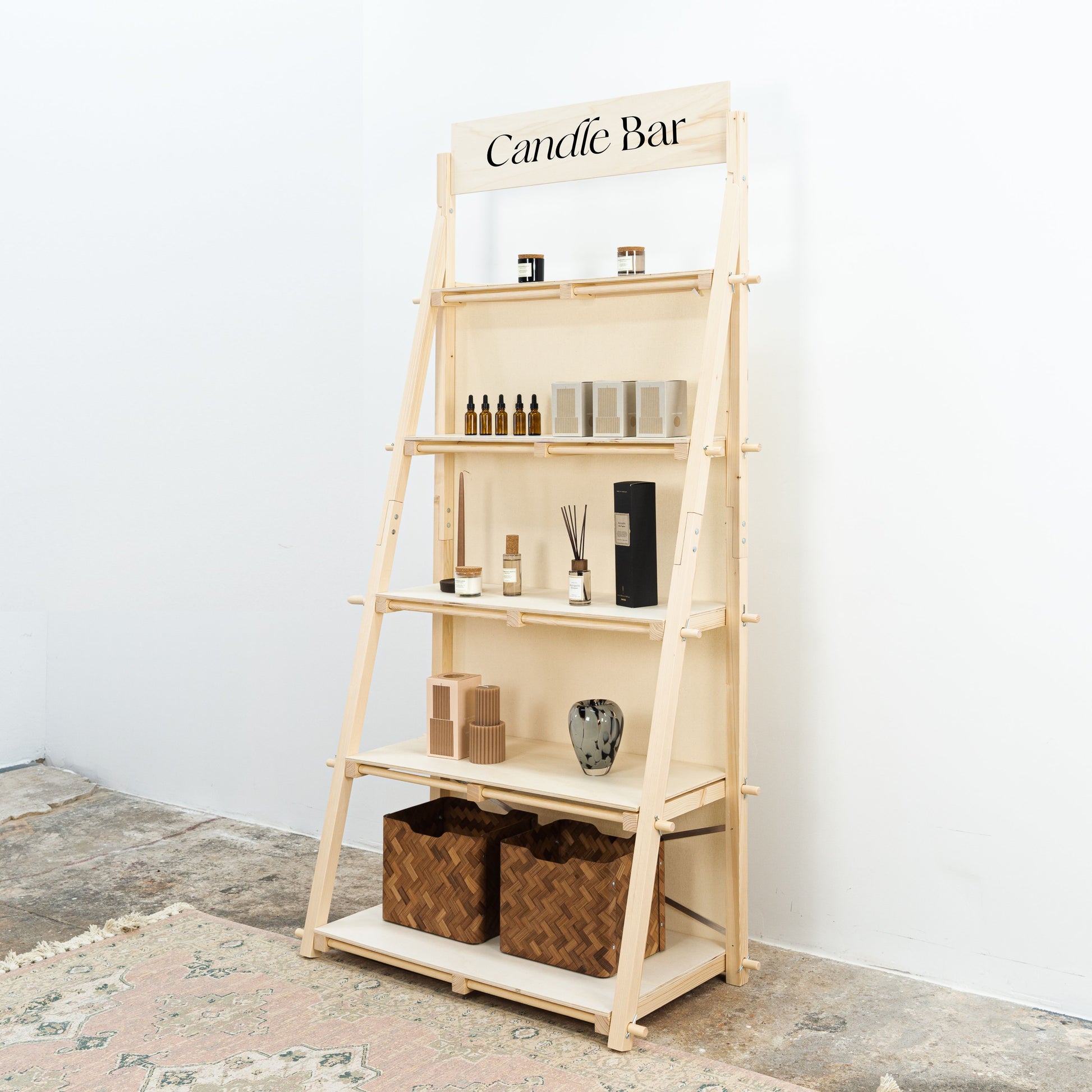 Eco-friendly vertical shelving unit for craft markets and vendor stands.