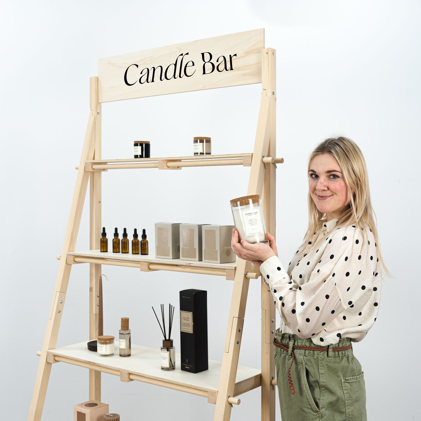 Eco-friendly, flat-pack shelving unit with a minimalist aesthetic, ideal for showcasing products.