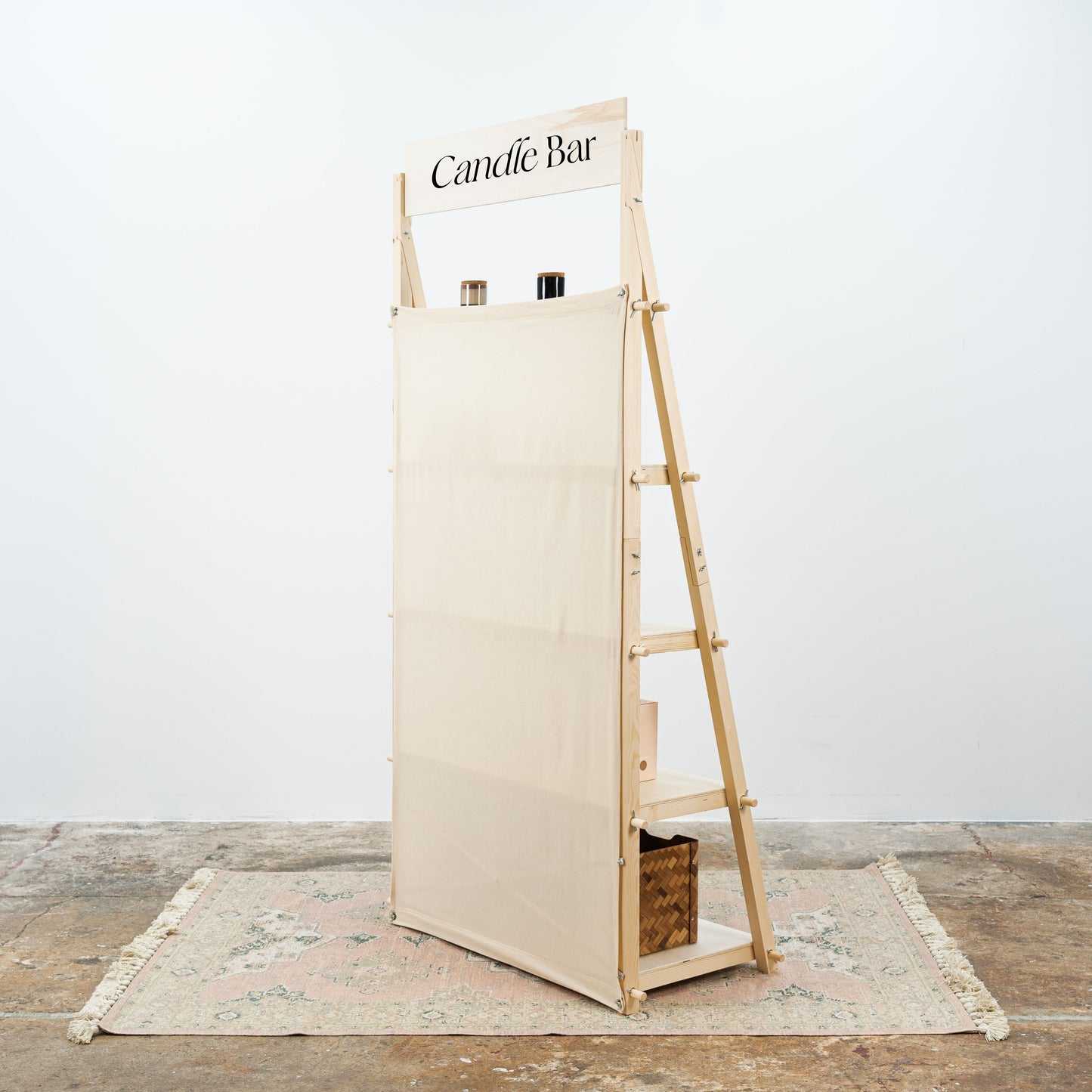 Collapsible shelving unit with tool-free assembly for event displays.