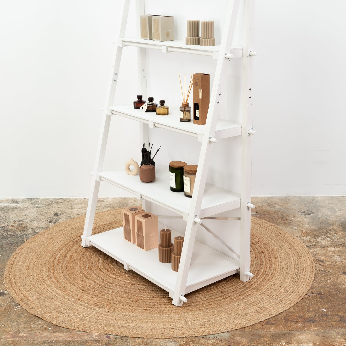 Tool-free assembly shelving unit in white, perfect for vendor booths and product showcases