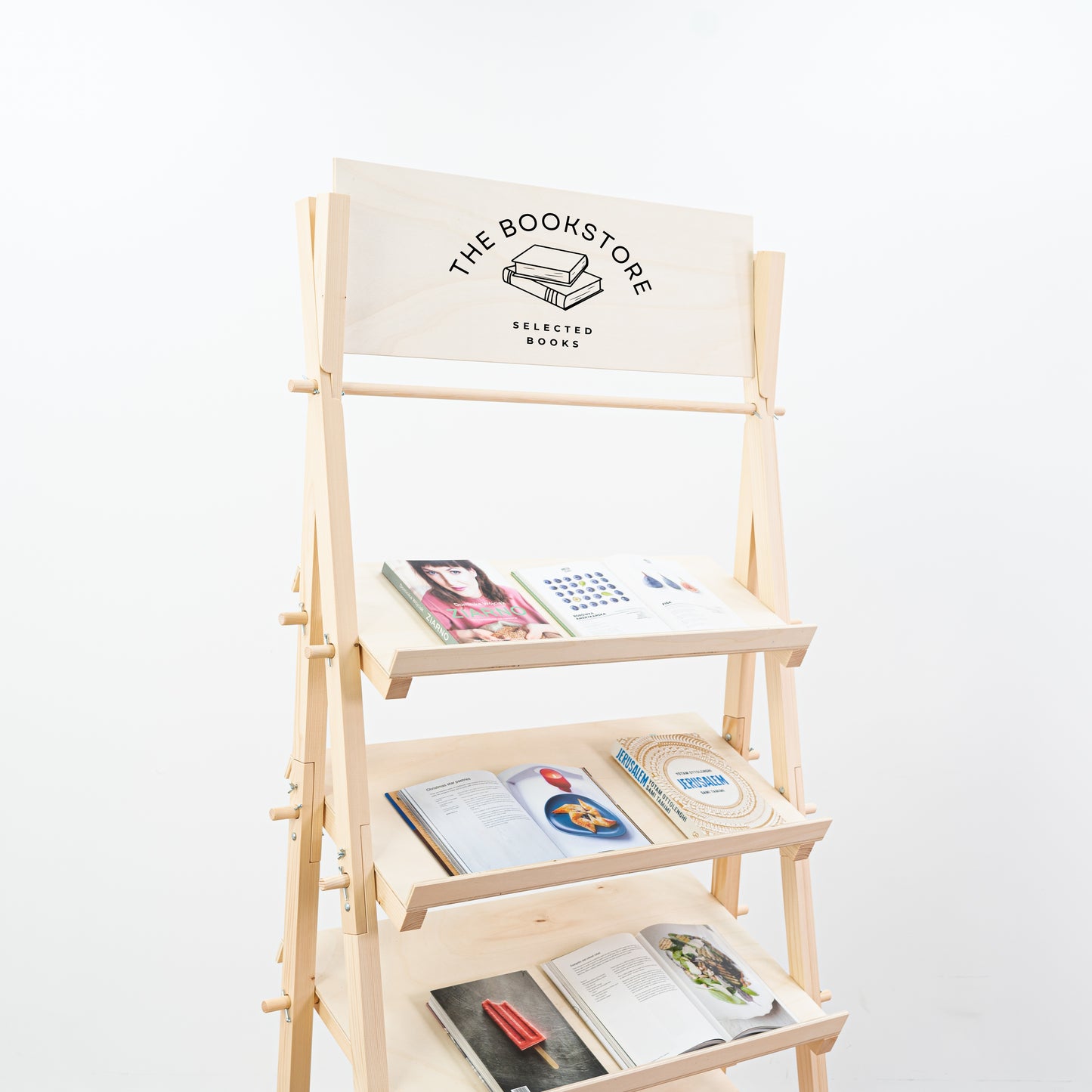 Close-up of display rack holding artisan home goods and modern interior accents