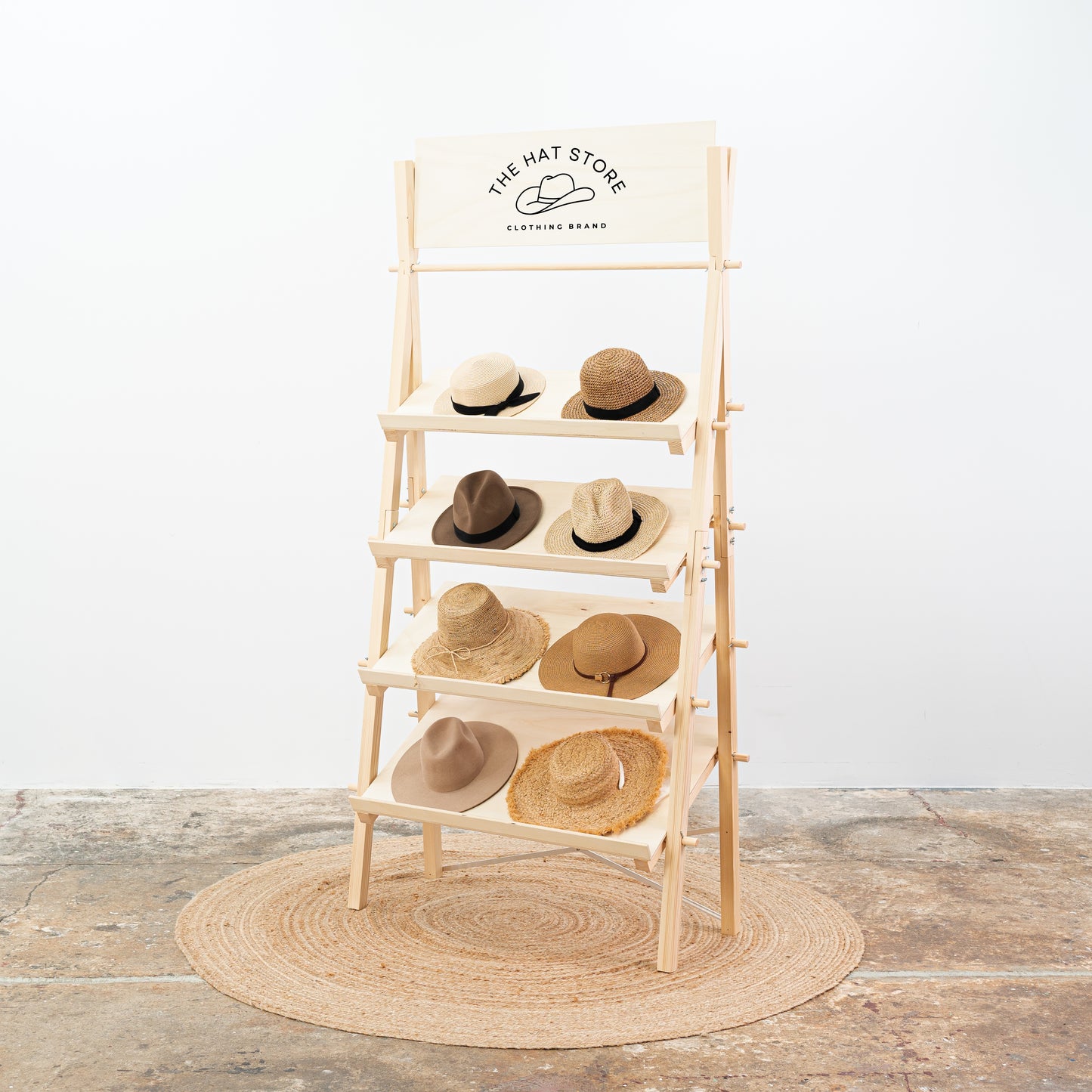 Foldable wooden shelving unit showcasing minimalist interior decor pieces