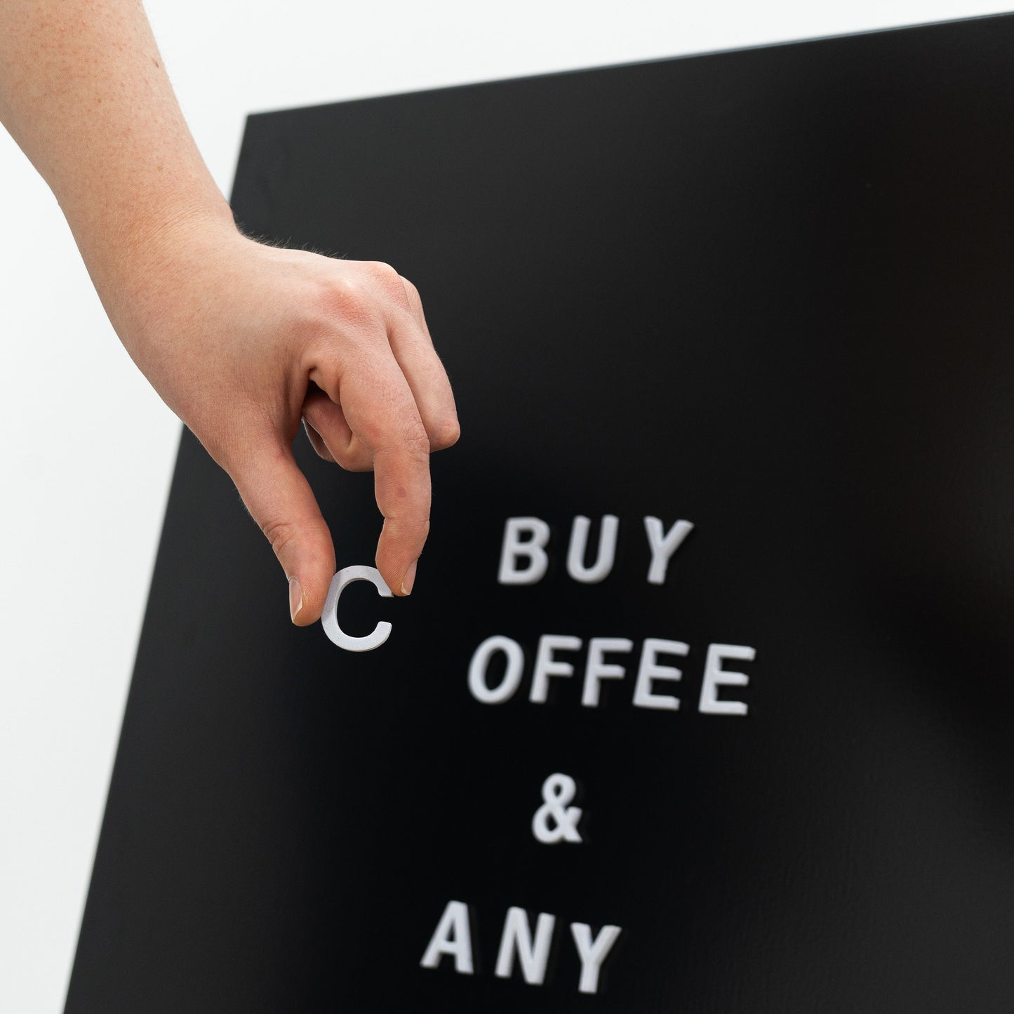 customizable black sandwich board sign with decals