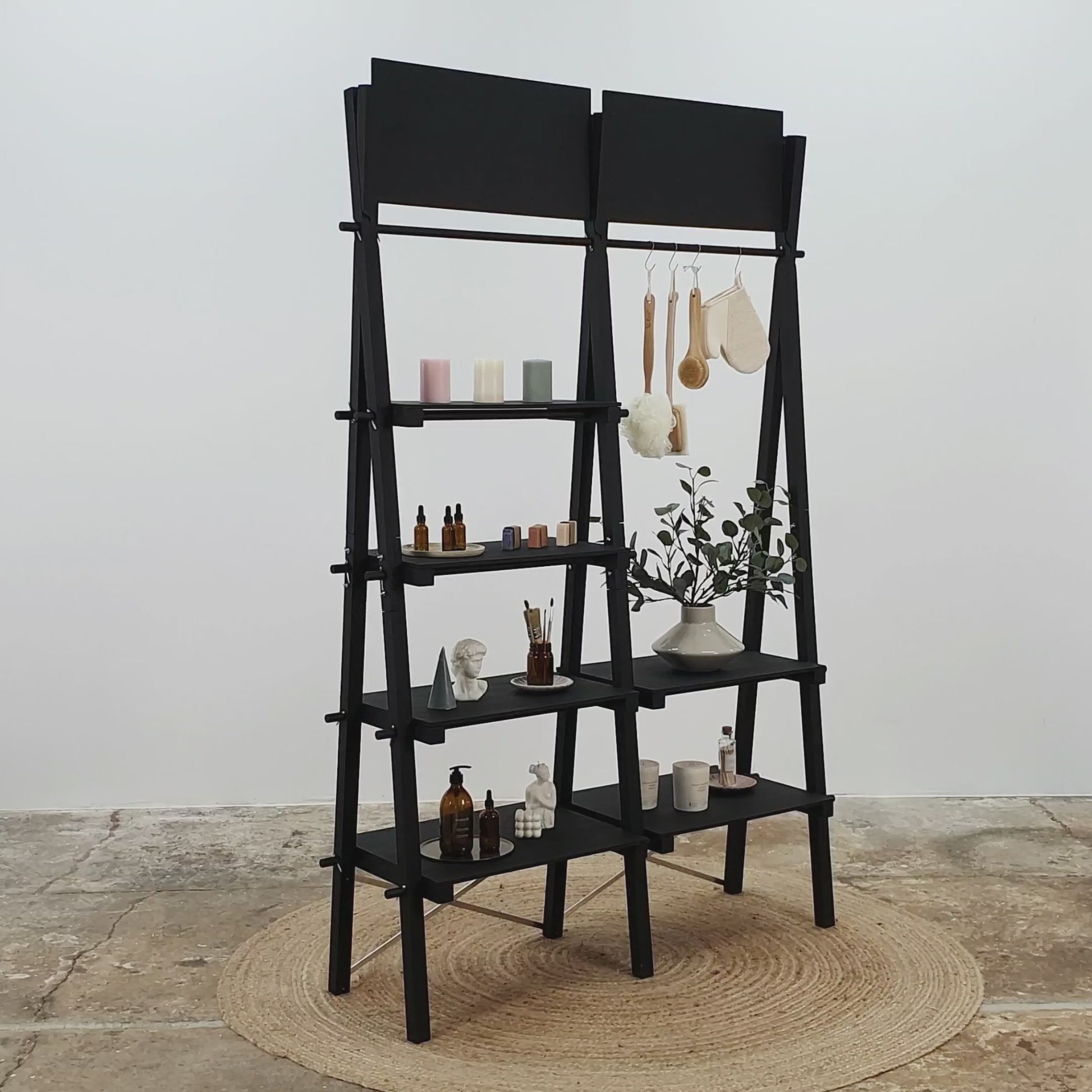 Black wooden double display stand with shelves for vendor spaces