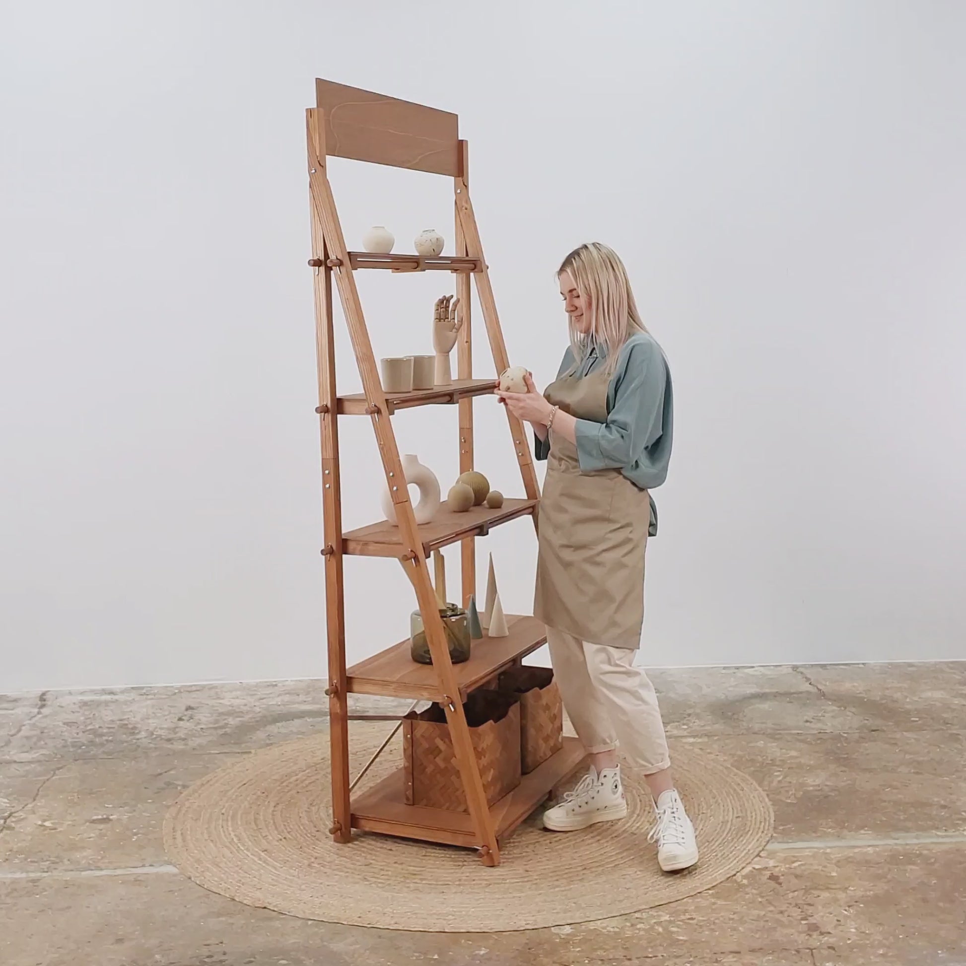 Visual showcase of coffee-colored portable shelving unit for artisan and eco retail displays