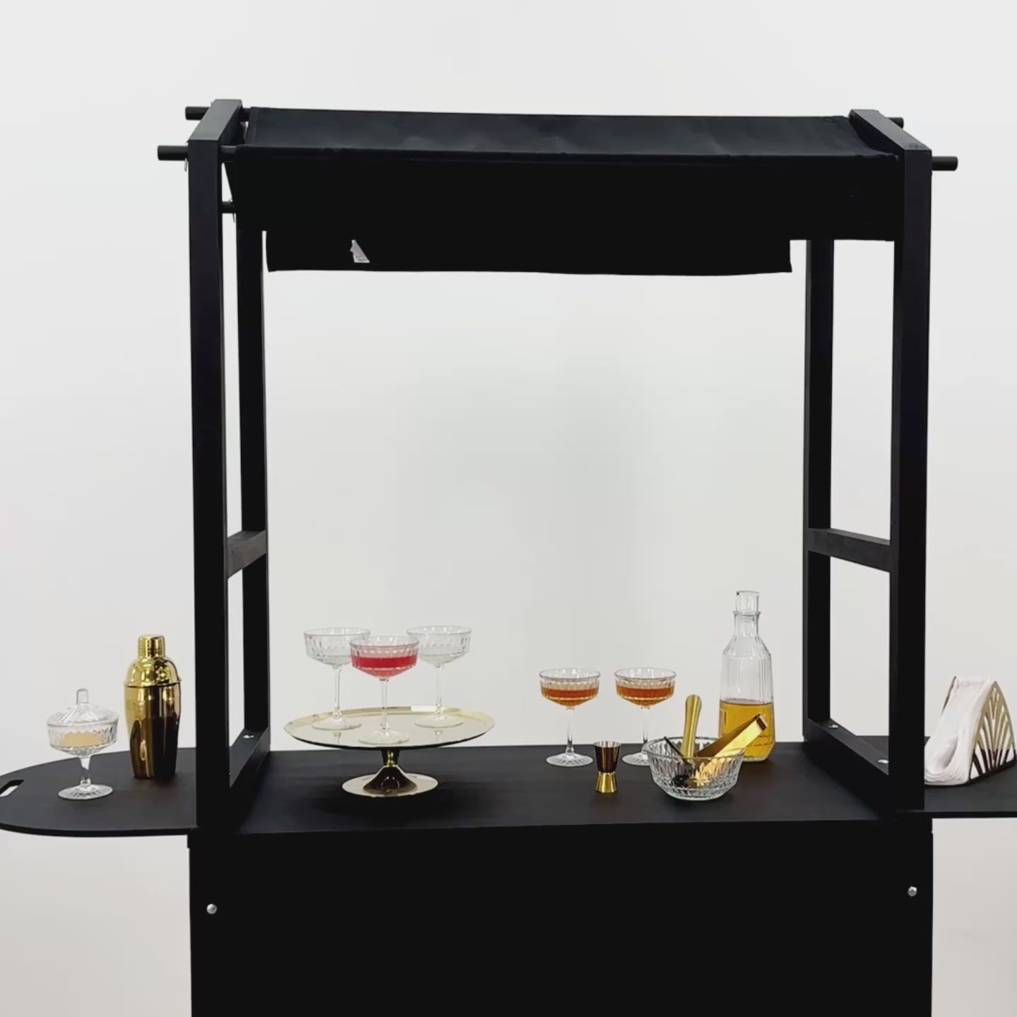 Video showcasing the black 'Have a dream' mobile cart with elegant glassware, perfect for events and brand promotion.