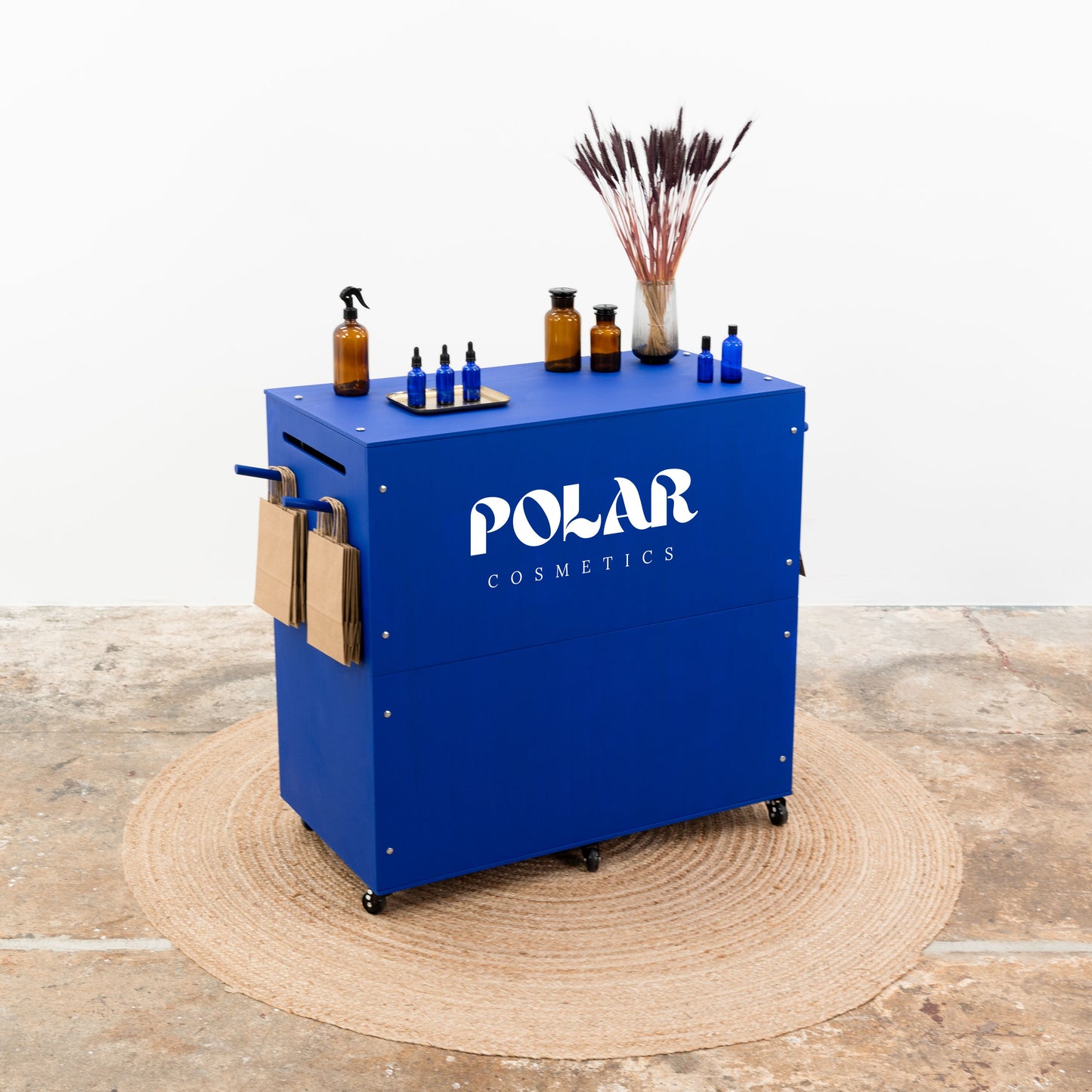 Event counter in custom finish with branded panel and POS items