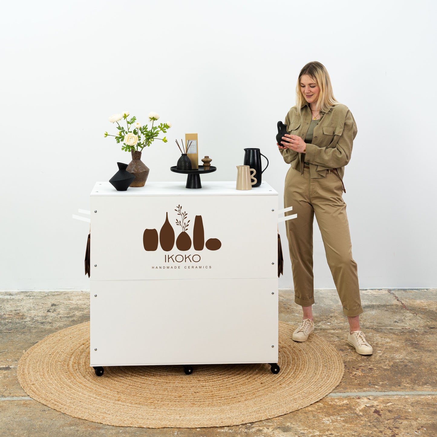Compact event counter with shelves and lockable sliding doors