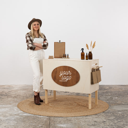Compact wooden checkout counter with customizable oval board