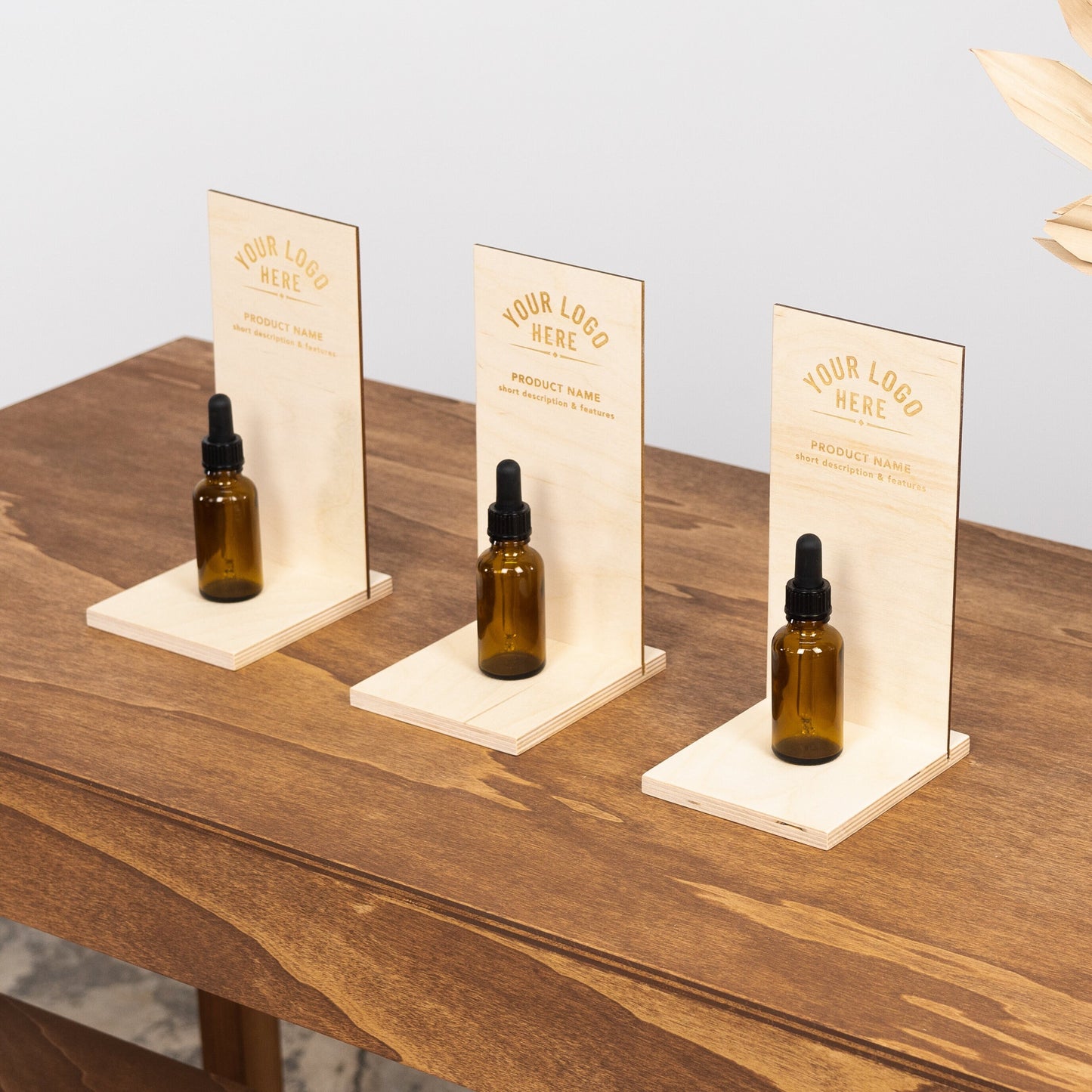 personalized wooden product display stand with engraved branding