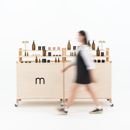 Portable wooden checkout counter with lockable wheels and modular design
