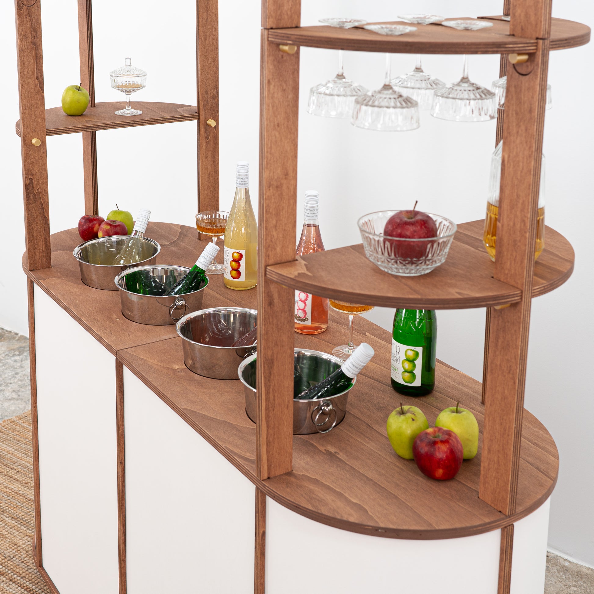Beverage cart with cut-out spaces for coolers, ideal for serving sparkling wine and craft cocktails at events.