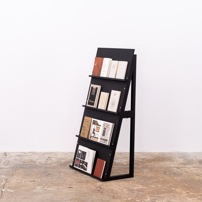 Modular magazine holder styled for a temporary retail environment