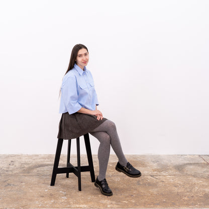Foldable black wooden bar stool with minimalist design