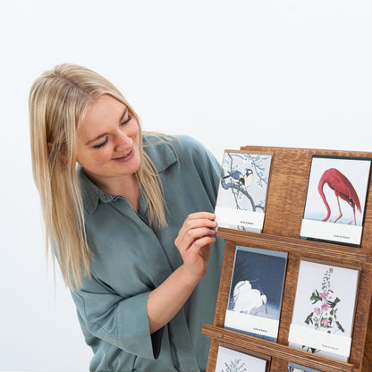 retail earring card stand used at jewelry shop counter

