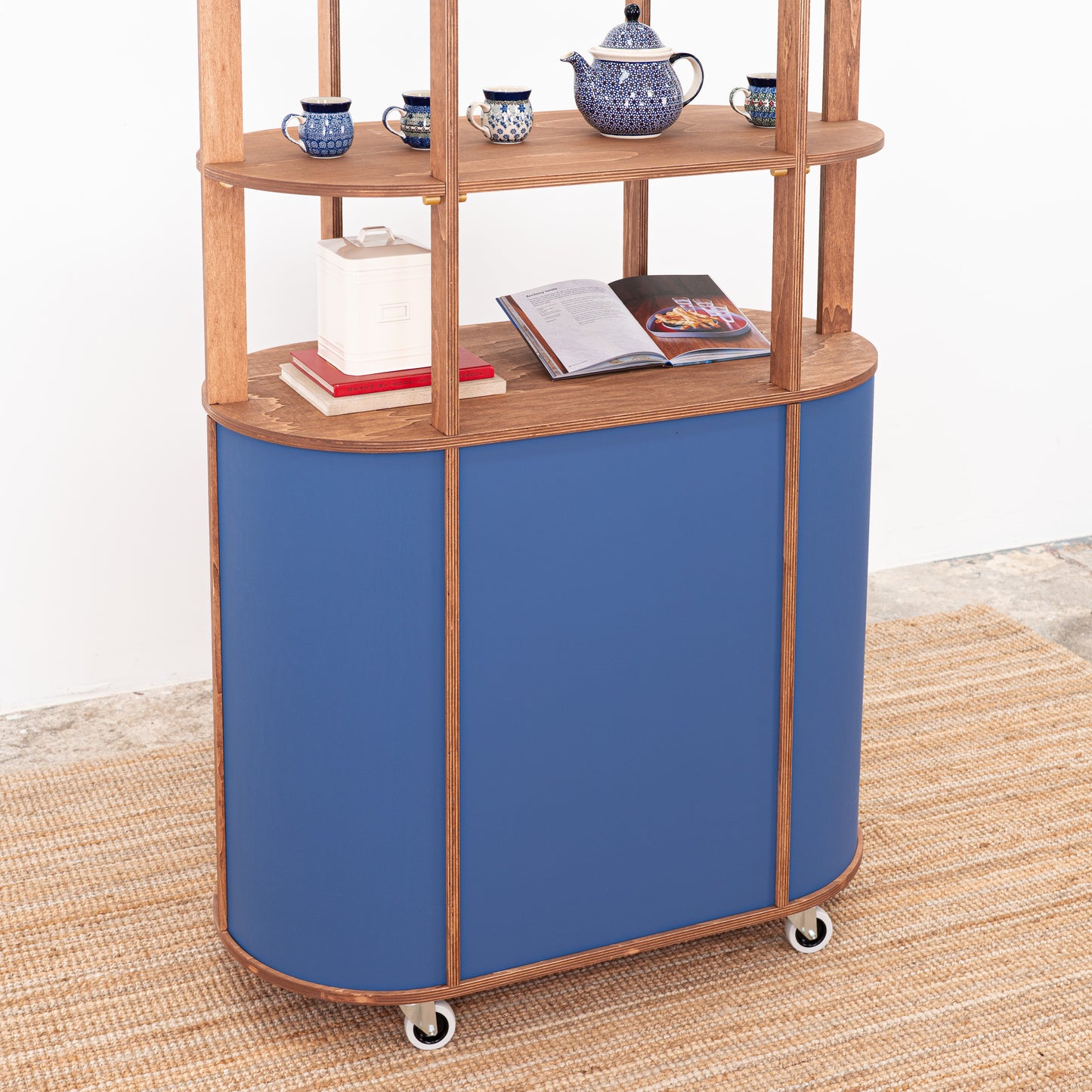 display cart with integrated storage shelf
