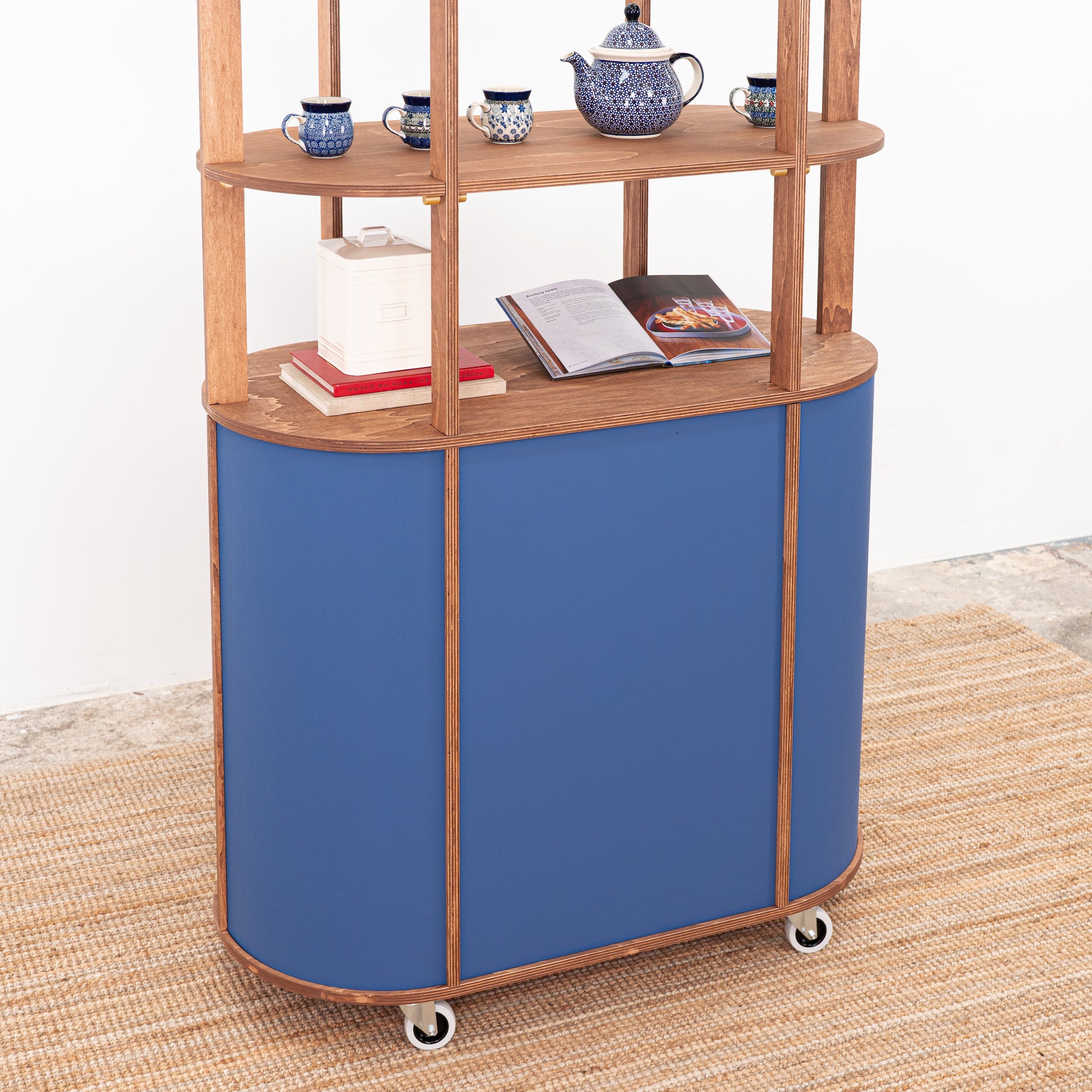 display cart with integrated storage shelf