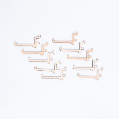 Set of 10 long hooks for pegboards, perfect for displaying larger products like clothing, accessories, and bags in retail and event displays.