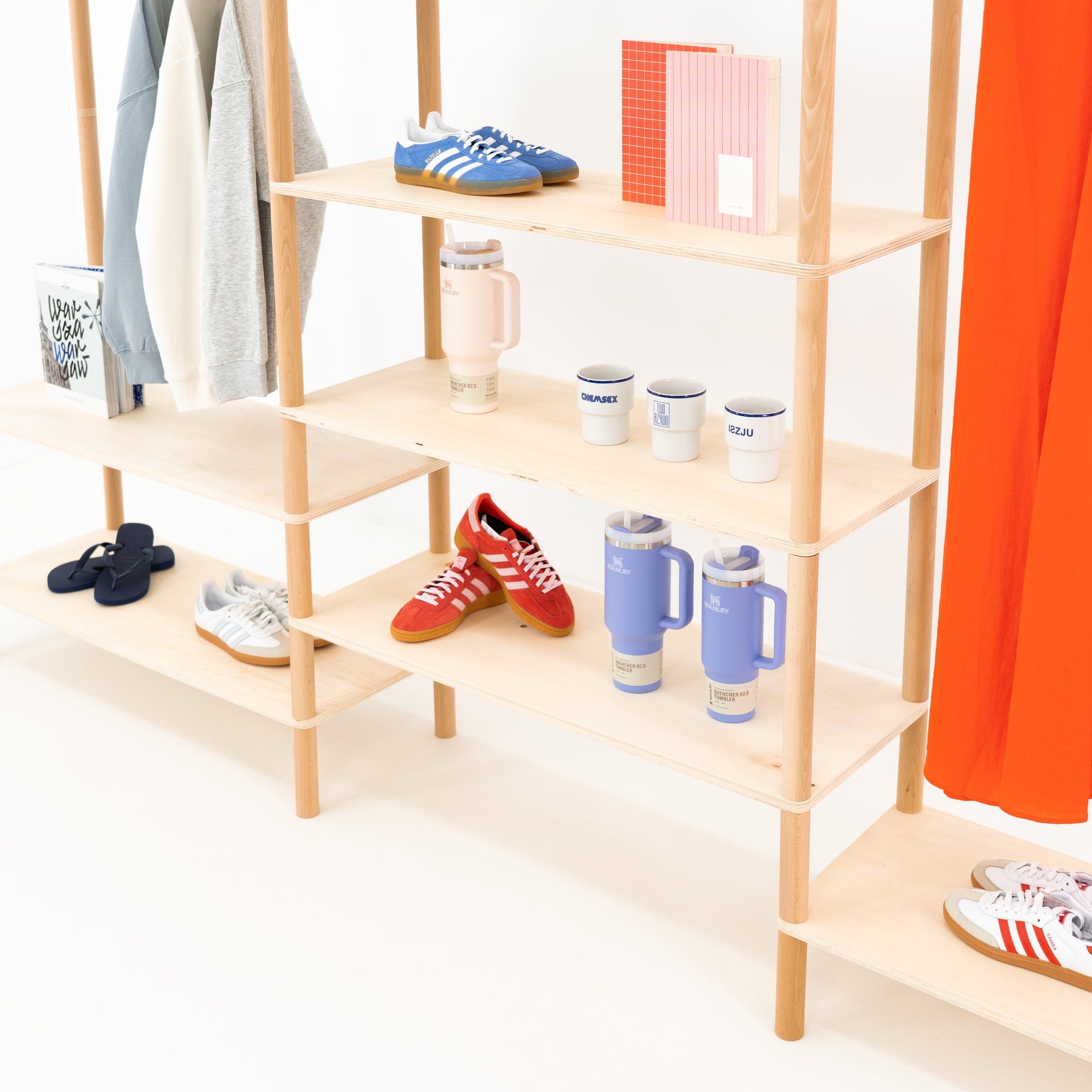 Natural wood retail shelf with three modular columns