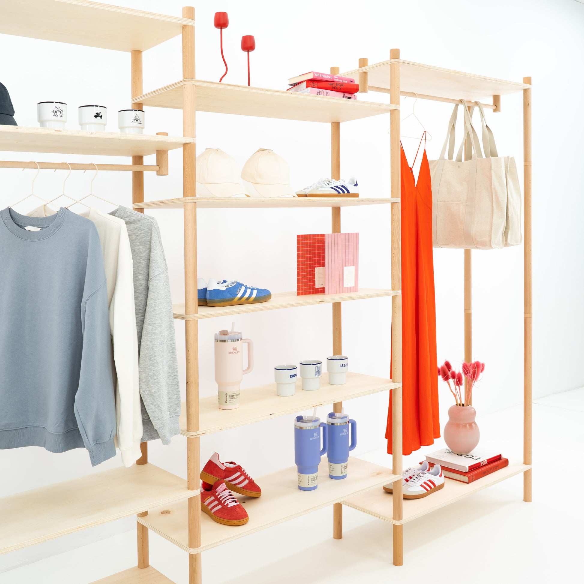 Flat-pack triple shelving system with intuitive setup