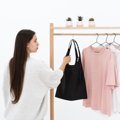 Lightweight wooden modular garment rack with lockable wheels for retail activations
