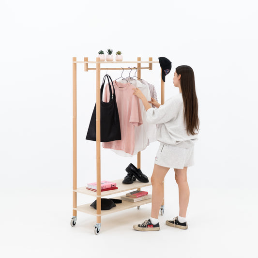 Portable clothing display with minimalist design for experiential marketing setups