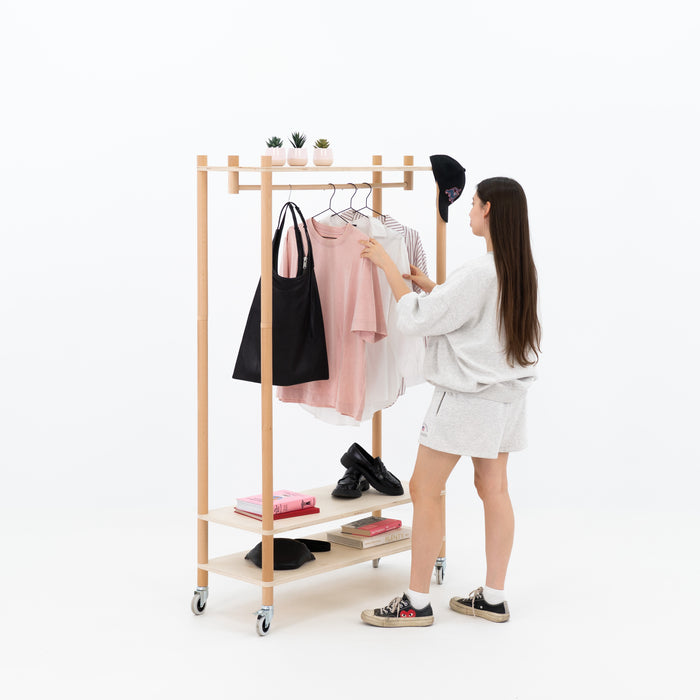Portable clothing display with minimalist design for experiential marketing setups
