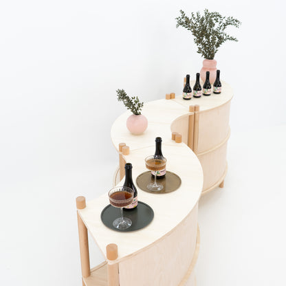 concave front plywood module with natural wood finish – bambuk checkout counter
